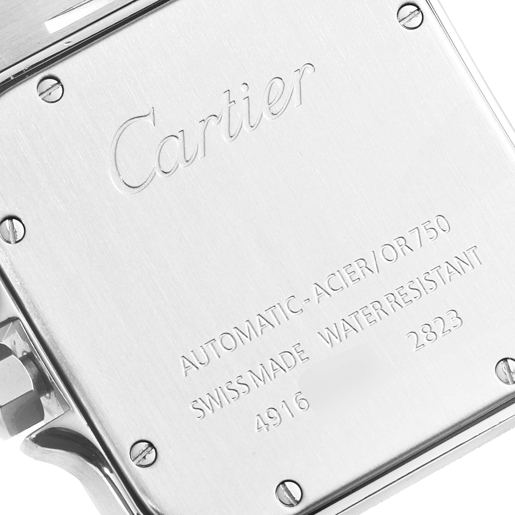 This image shows the back case of a Santos model by Cartier, highlighting the engraved branding and specifications.