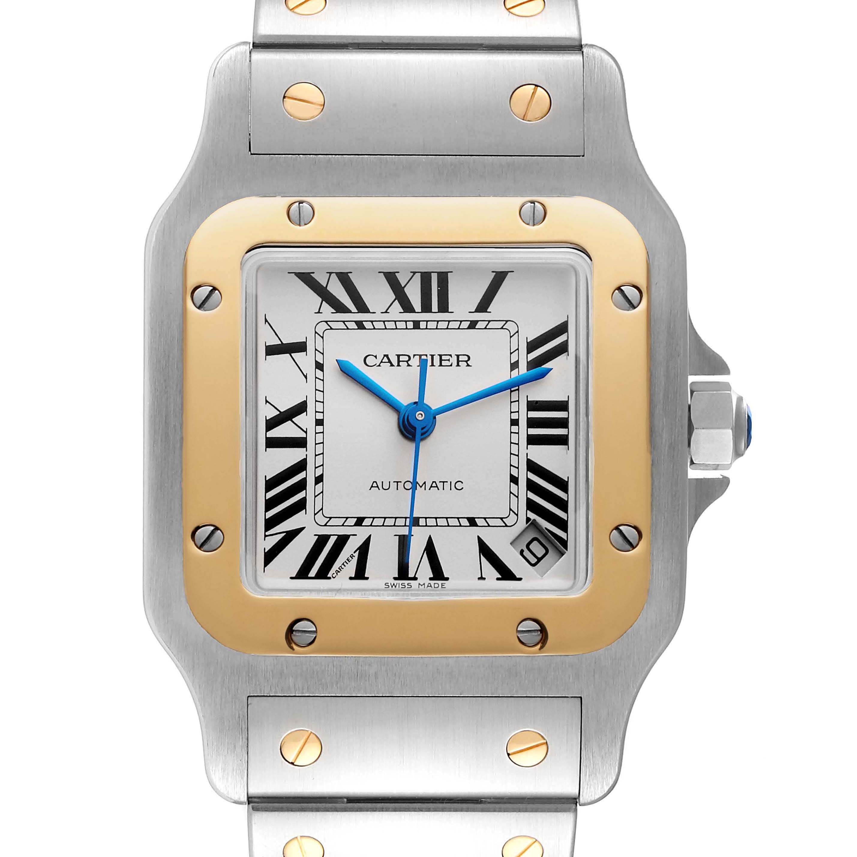 The image shows a frontal view of a Cartier Santos W20099C4 Men
s Steel and Gold (two tone) Silver Dial W20099C4 Men
s Steel and Gold (two tone) Silver Dial model watch, highlighting the dial, bezel, and part of the bracelet.