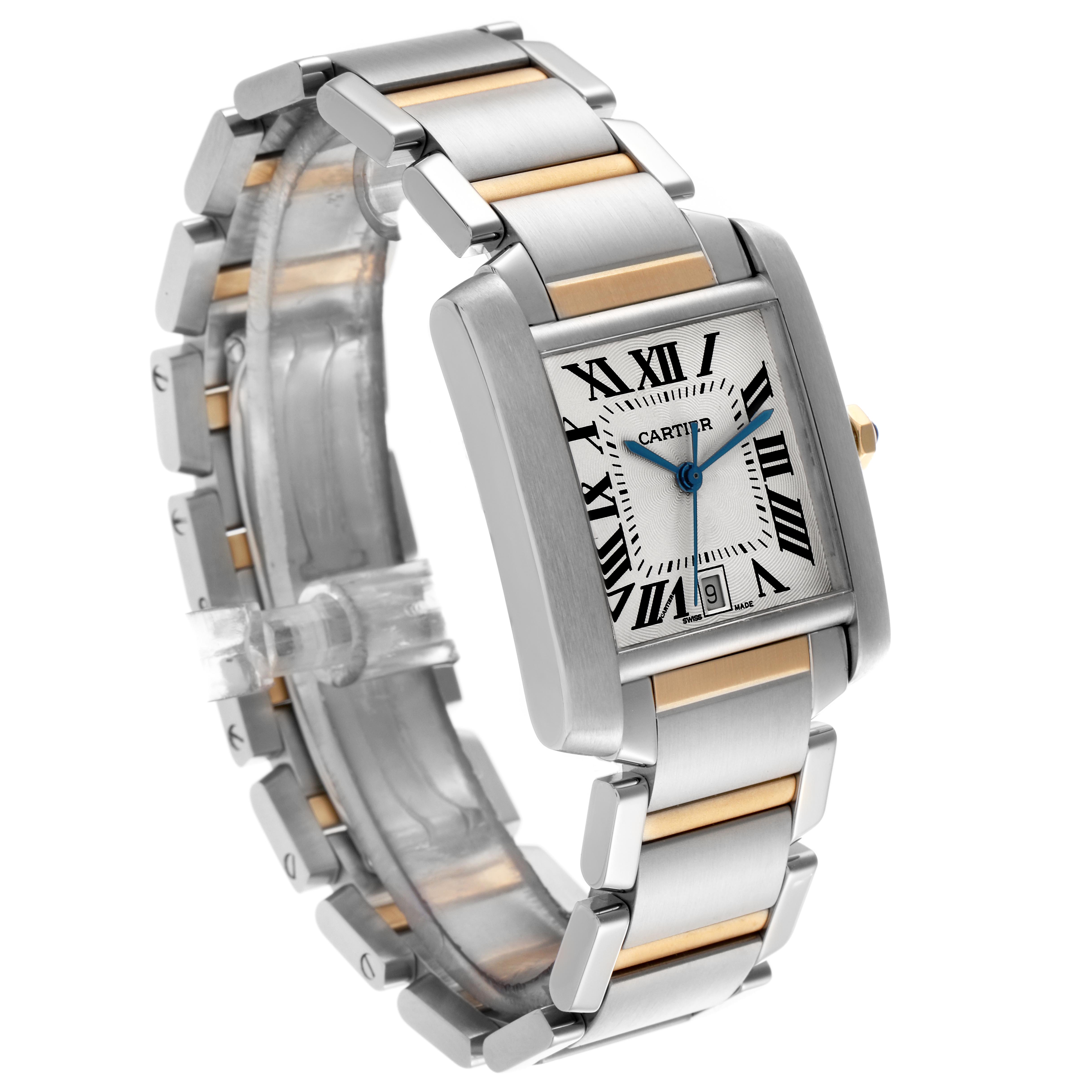 The Cartier Tank Francaise W51005Q4 Men's Steel and Gold (two tone) Silver Dial watch is shown at an angle displaying the face, Roman numerals, bracelet, and crown.