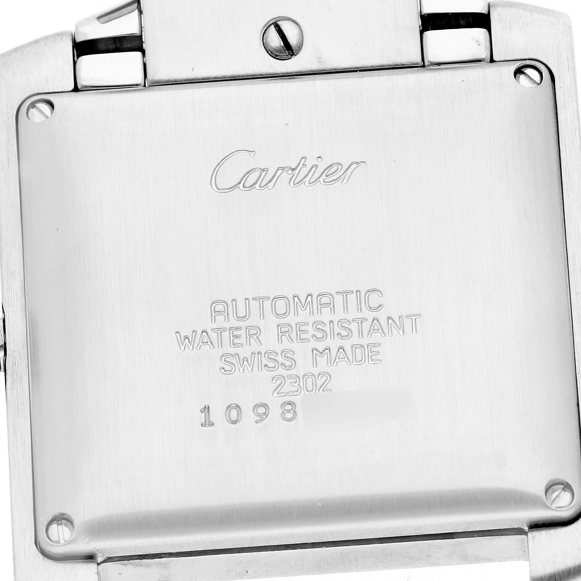 The image shows the back case of a Cartier Tank Française watch from a top-down angle.