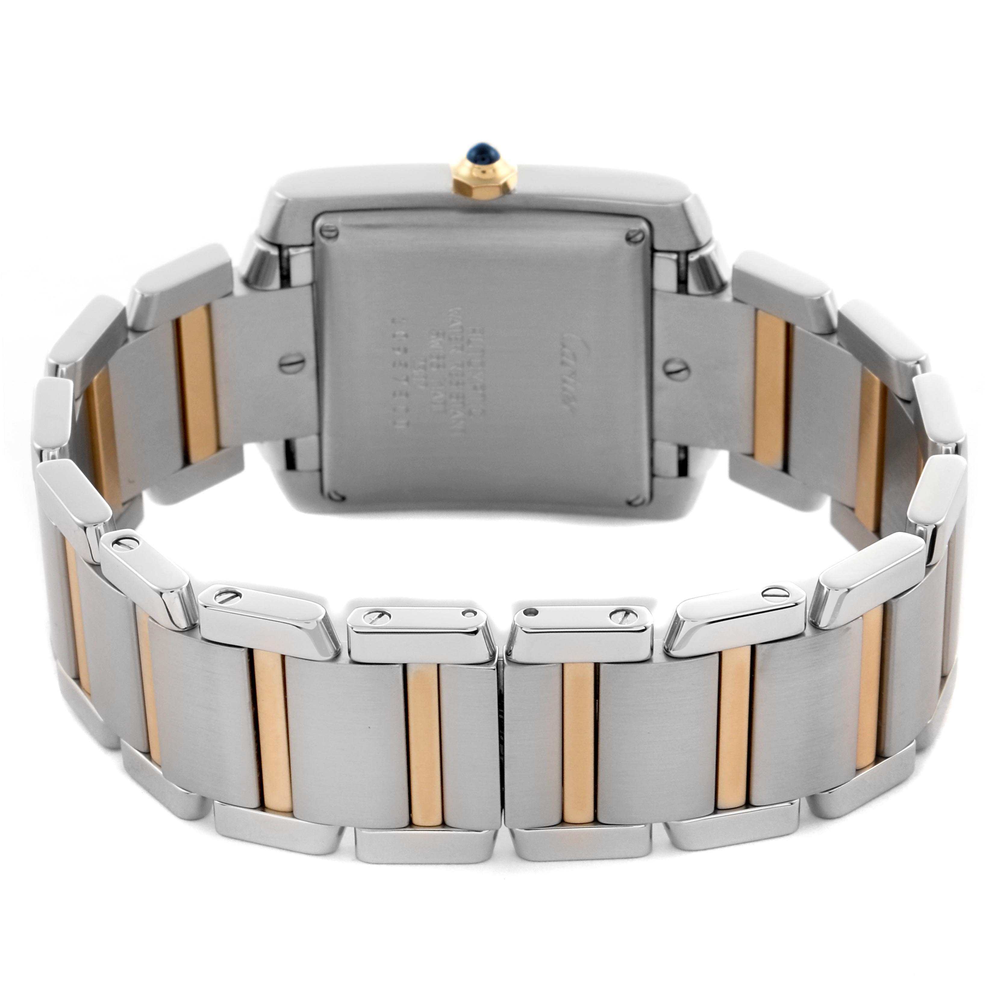 The image shows the back of the Cartier Tank Française watch highlighting its metal bracelet and case back.