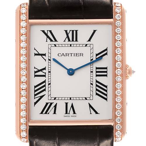 The image shows a Cartier Tank Louis watch face from the front, highlighting its diamond-encrusted bezel and Roman numerals.