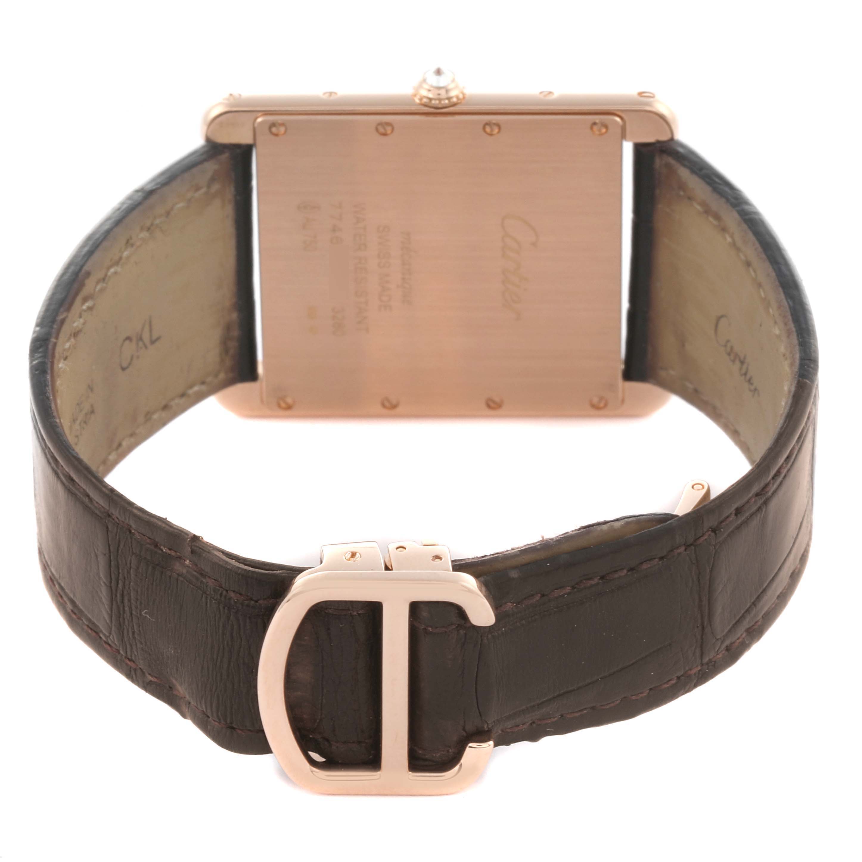 The image shows the back case and strap of a Cartier Tank Louis WT200005 Men's Rose Gold Silver Dial WT200005 Men's Rose Gold Silver Dial watch, highlighting the buckle and case back details.