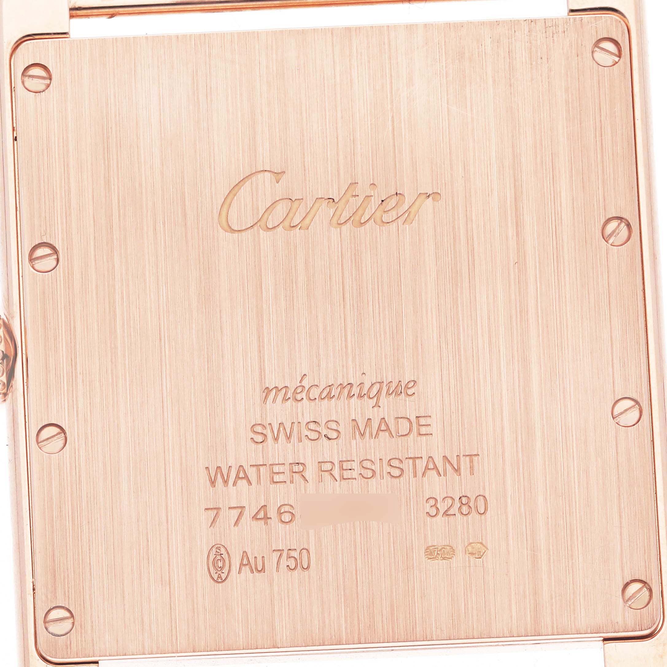 The image shows the back of the Cartier Tank Louis WT200005 Men's Rose Gold Silver Dial watch with engraved details.