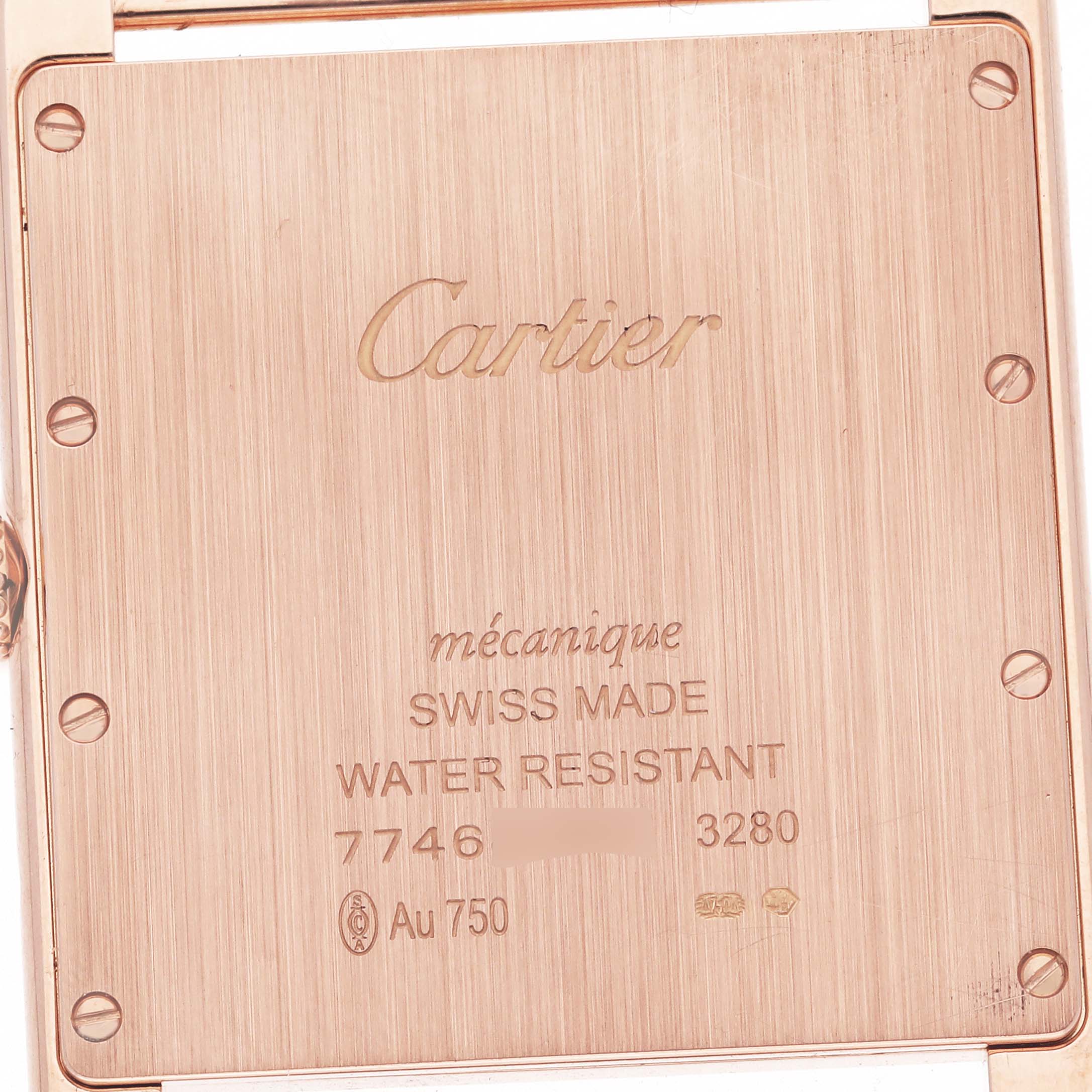 The image shows the back of a Cartier Tank Louis WT200005 Men's Rose Gold Silver Dial WT200005 Men's Rose Gold Silver Dial watch, highlighting engravings and the metal finish.