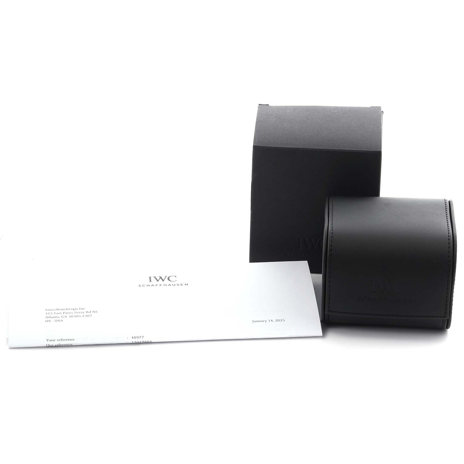 The image shows the packaging and documents for an IWC Portuguese IW390302 Men's Stainless Steel Silver Dial IW390302 Men's Stainless Steel Silver Dial watch, including a black box, a watch case, and paperwork.