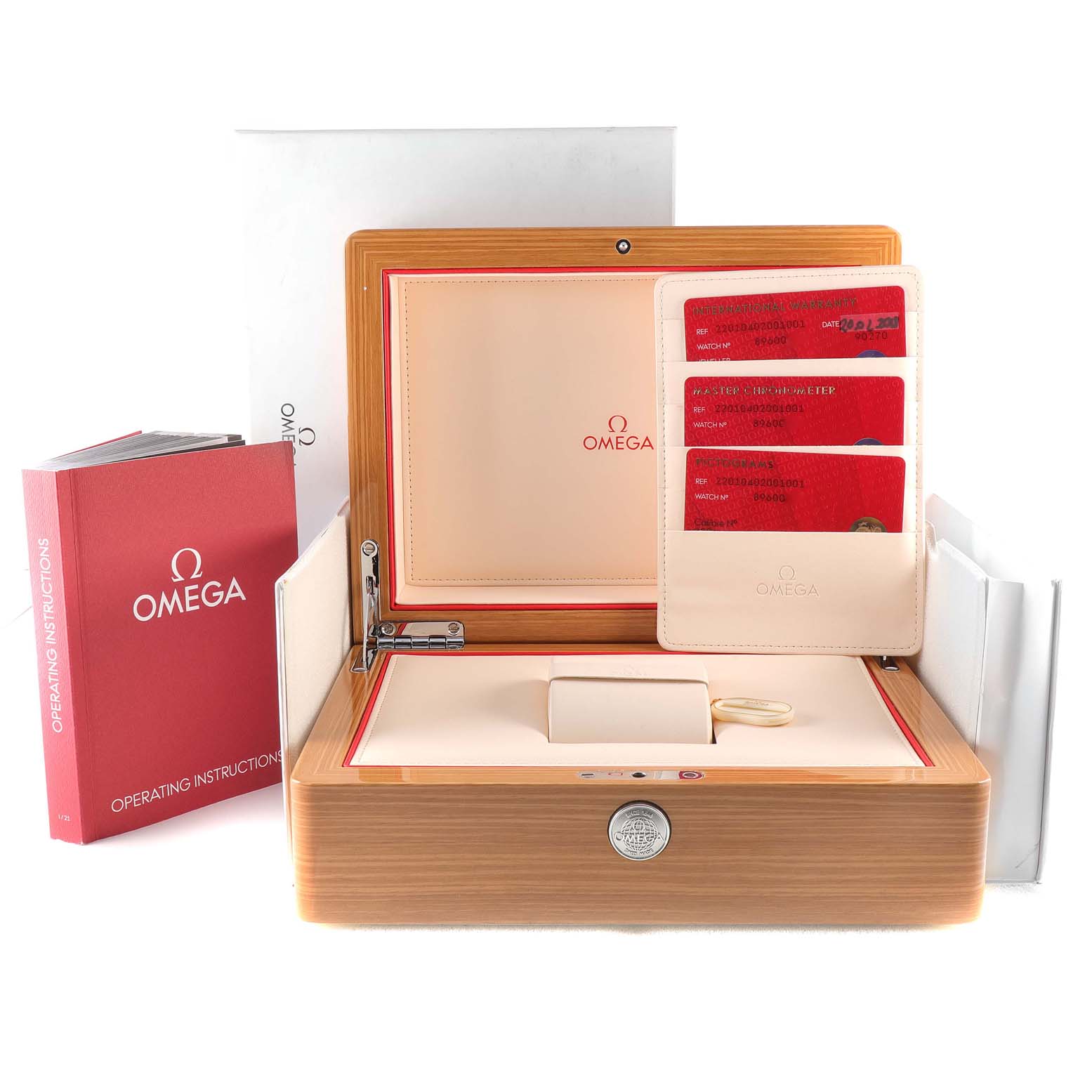 The image shows the packaging and accessories, including the box, warranty cards, and manual for an Omega Aqua Terra 220.10.40.20.01.001 Men's Stainless Steel Black Dial 220.10.40.20.01.001 Men's Stainless Steel Black Dial watch.