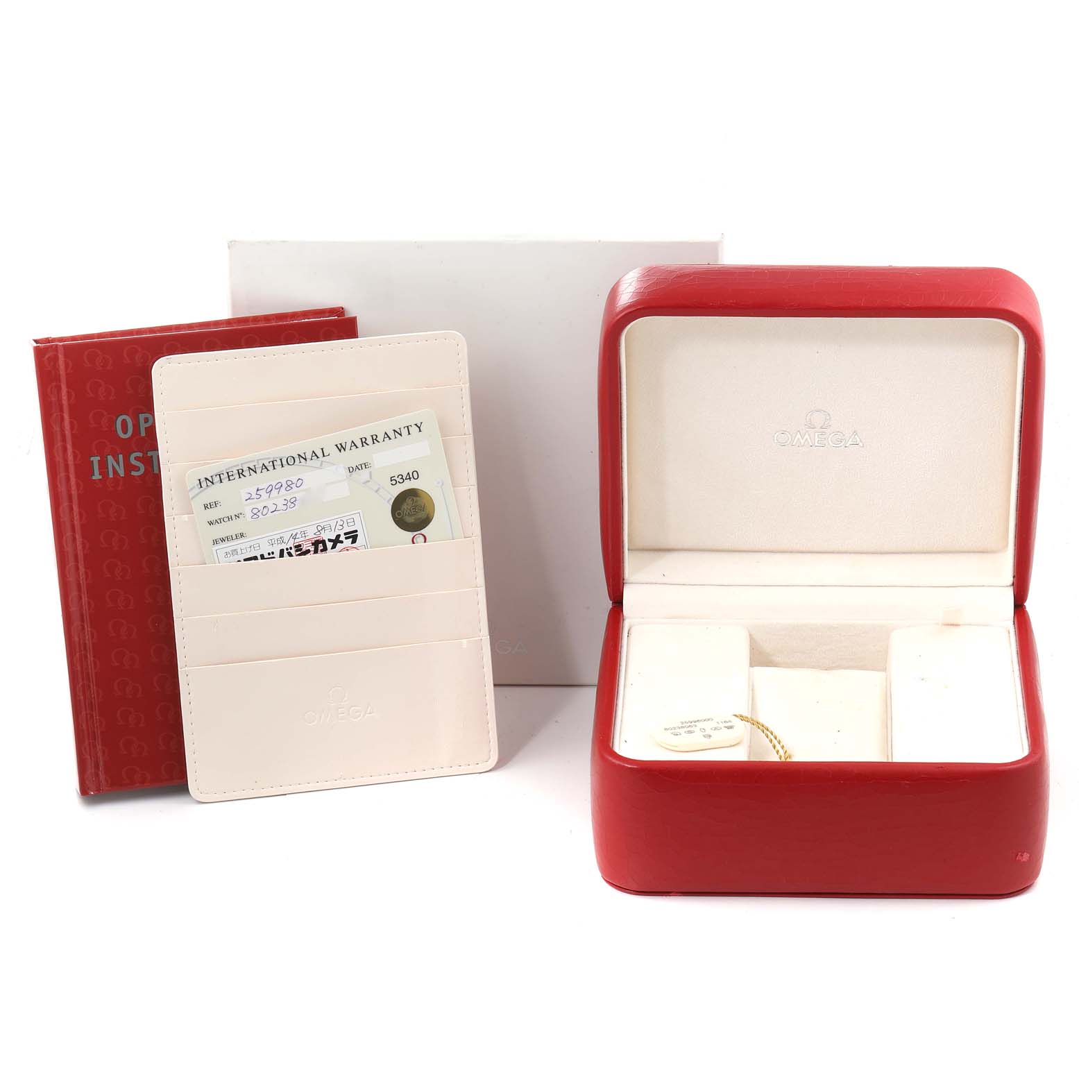 This image shows the Omega Seamaster 2599.80.00 Men's Stainless Steel Blue Dial 2599.80.00 Men's Stainless Steel Blue Dial watch's packaging, warranty card, manual, and empty watch box from a frontal angle.