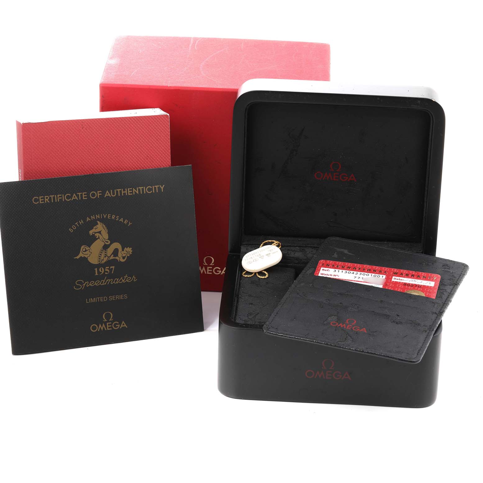The image shows the packaging and accessories, including a certificate, box, and card holder, for the Omega Speedmaster 311.30.42.30.01.001 Men's Stainless Steel Black Dial 311.30.42.30.01.001 Men's Stainless Steel Black Dial 1957 Anniversary model.