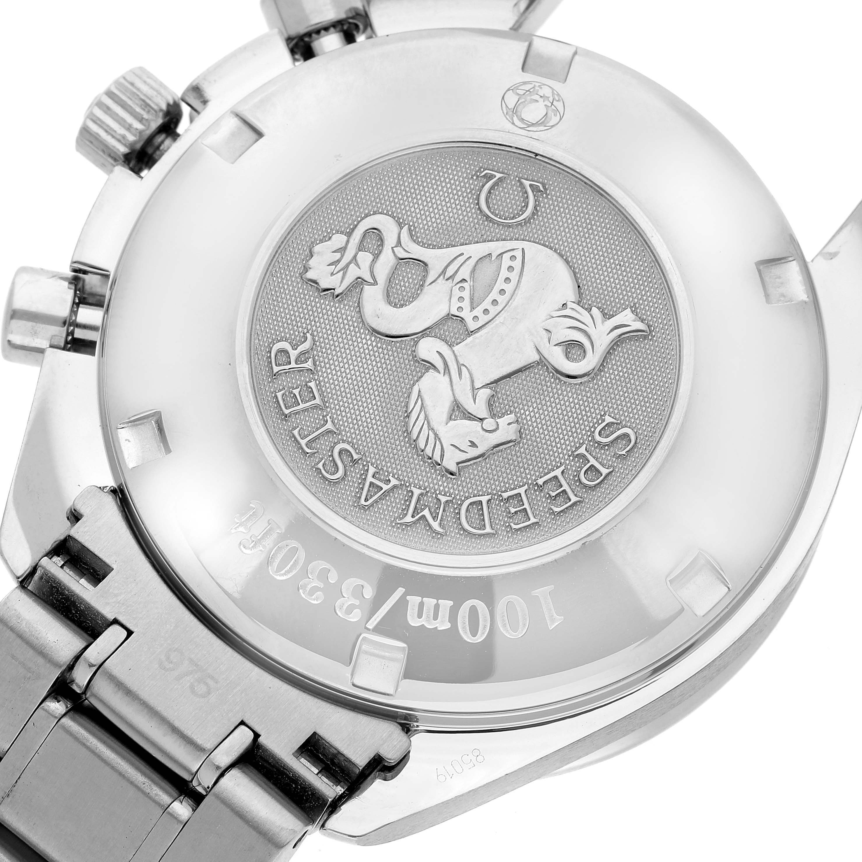 The image shows the back and part of the bracelet of an Omega Speedmaster 3220.50.00 Men's Stainless Steel Black Dial 3220.50.00 Men's Stainless Steel Black Dial watch, highlighting its emblem and engravings.