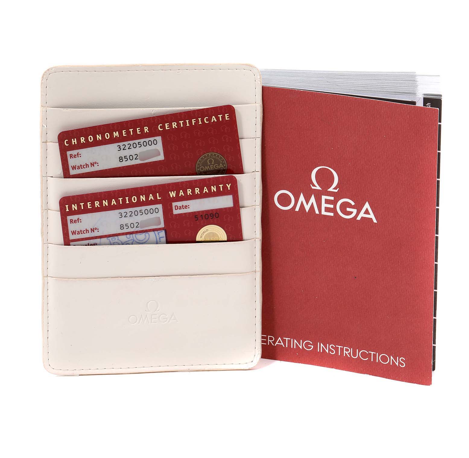 The image shows the warranty cards and instruction manual for a Speedmaster model by Omega.