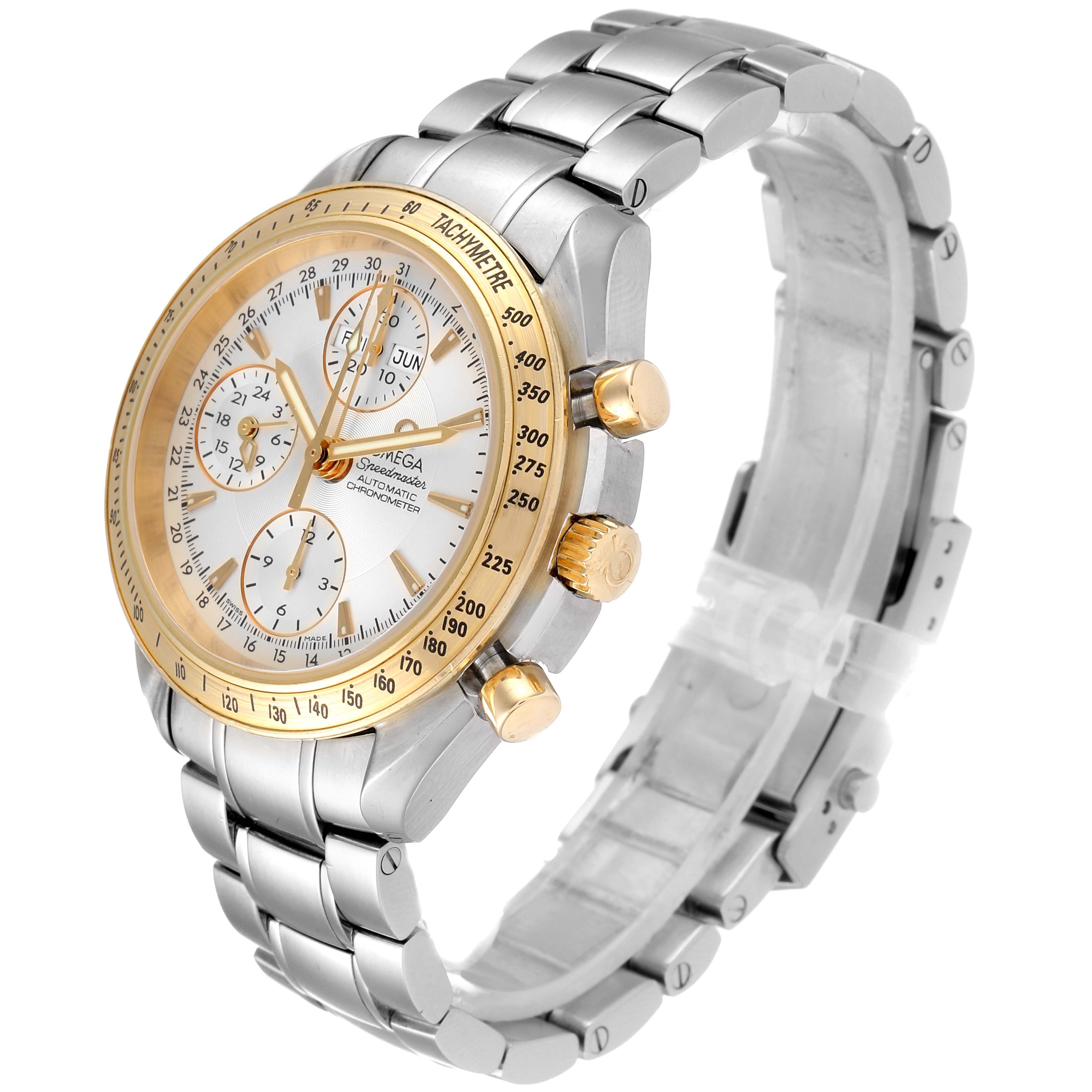 The Omega Speedmaster 323.21.40.44.02.001 Men's Steel and Gold (two tone) Silver Dial 323.21.40.44.02.001 Men's Steel and Gold (two tone) Silver Dial watch is shown at a 3/4 angle, highlighting the dial, bezel, and bracelet.