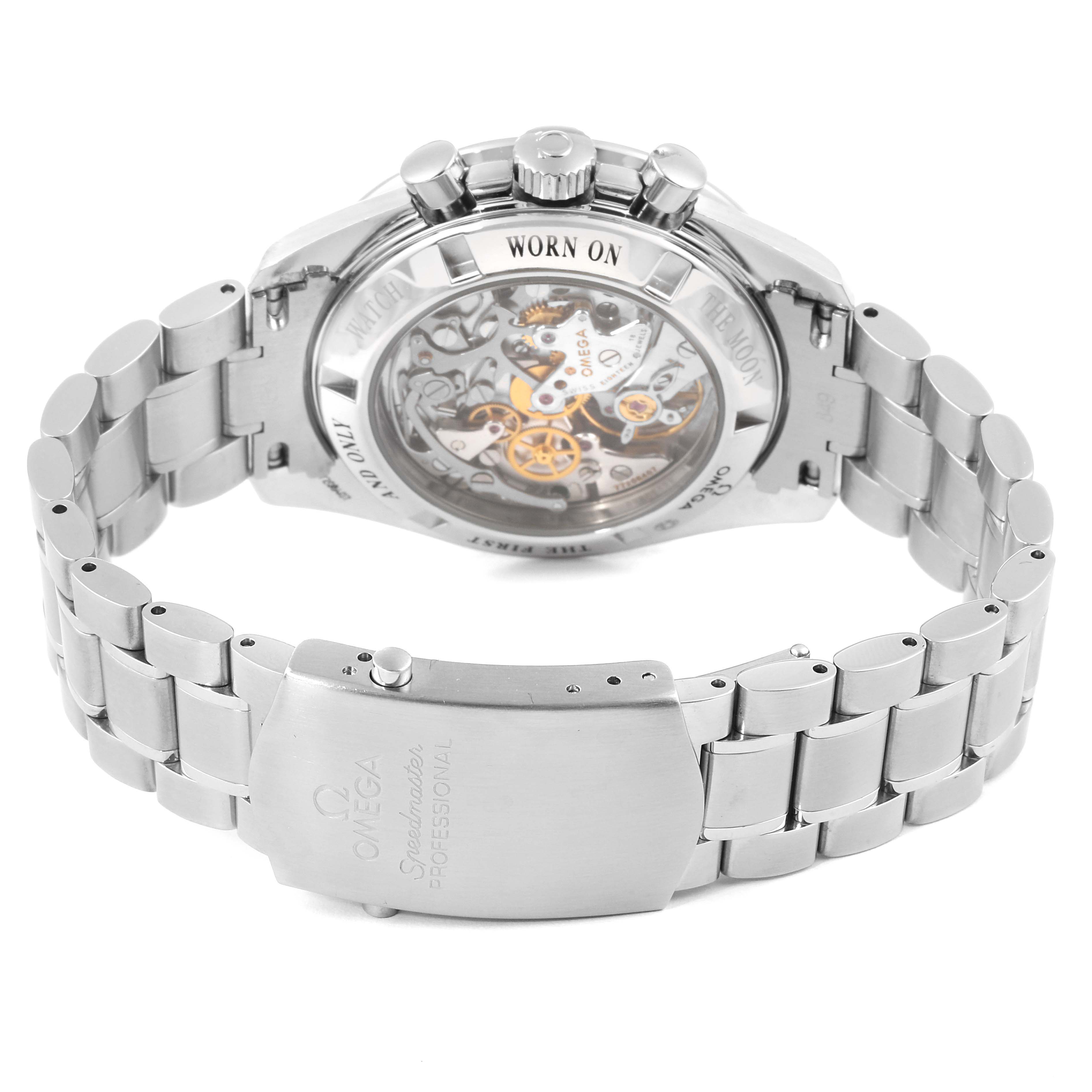 The image shows the back view of an Omega Speedmaster 3573.50.00 Men
s Stainless Steel Black Dial 3573.50.00 Men
s Stainless Steel Black Dial watch, highlighting the transparent case back and metal bracelet.