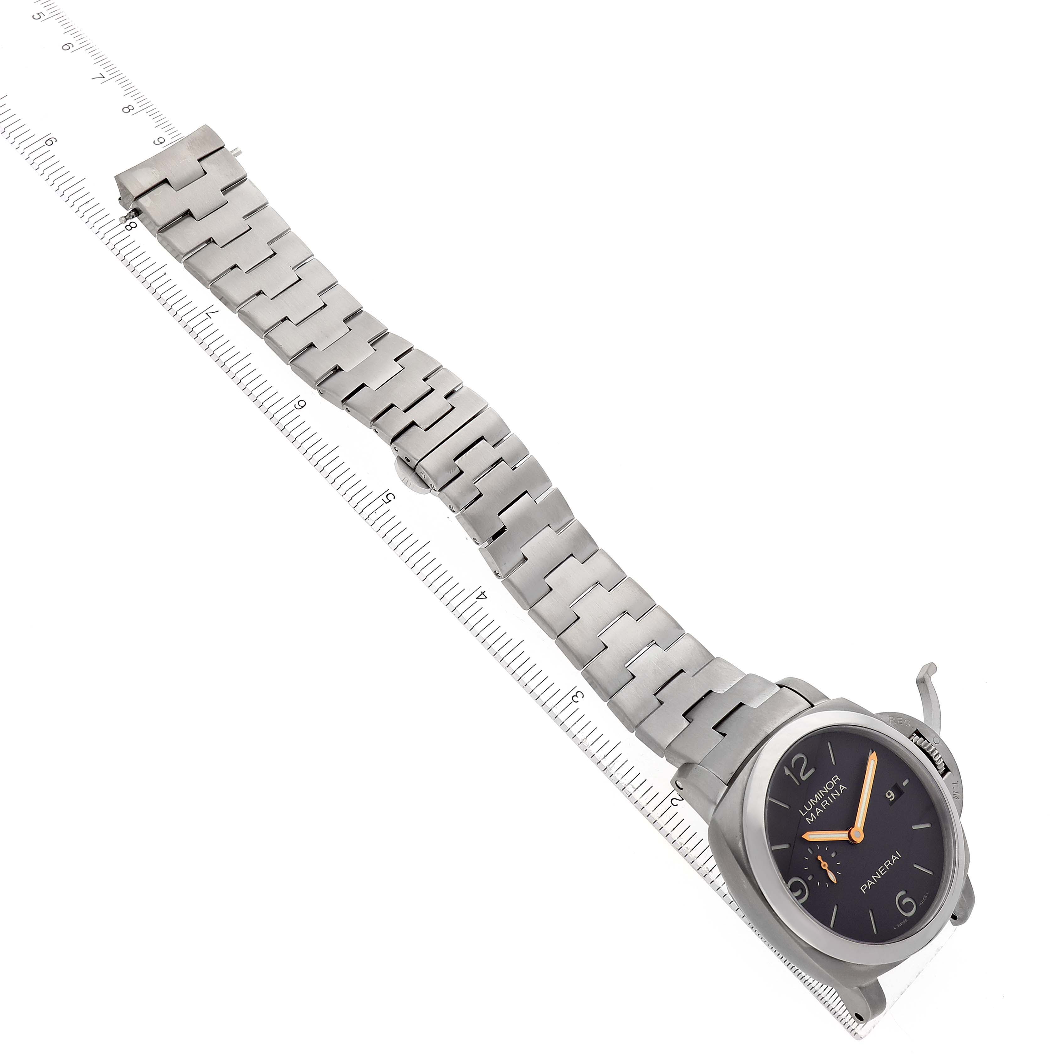 The image shows a Panerai Luminor PAM00352 Men's Titanium Brown Dial watch at an angle, featuring a metal bracelet and the face with hour markers and hands visible.