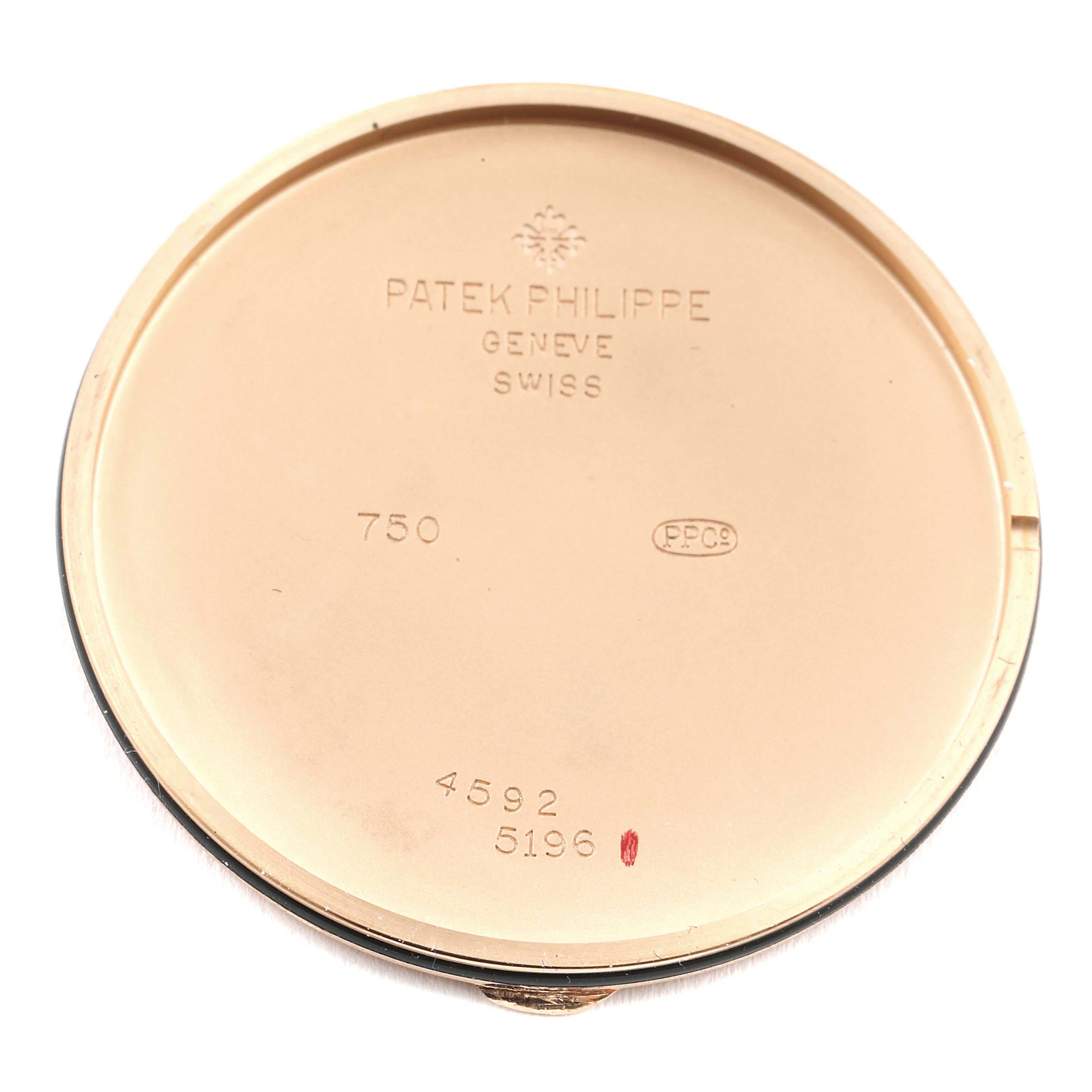 This image shows the inside case back of a Patek Philippe Calatrava 5196R Men's Rose Gold Silver Dial 5196R Men's Rose Gold Silver Dial watch, displaying engravings and hallmarks.