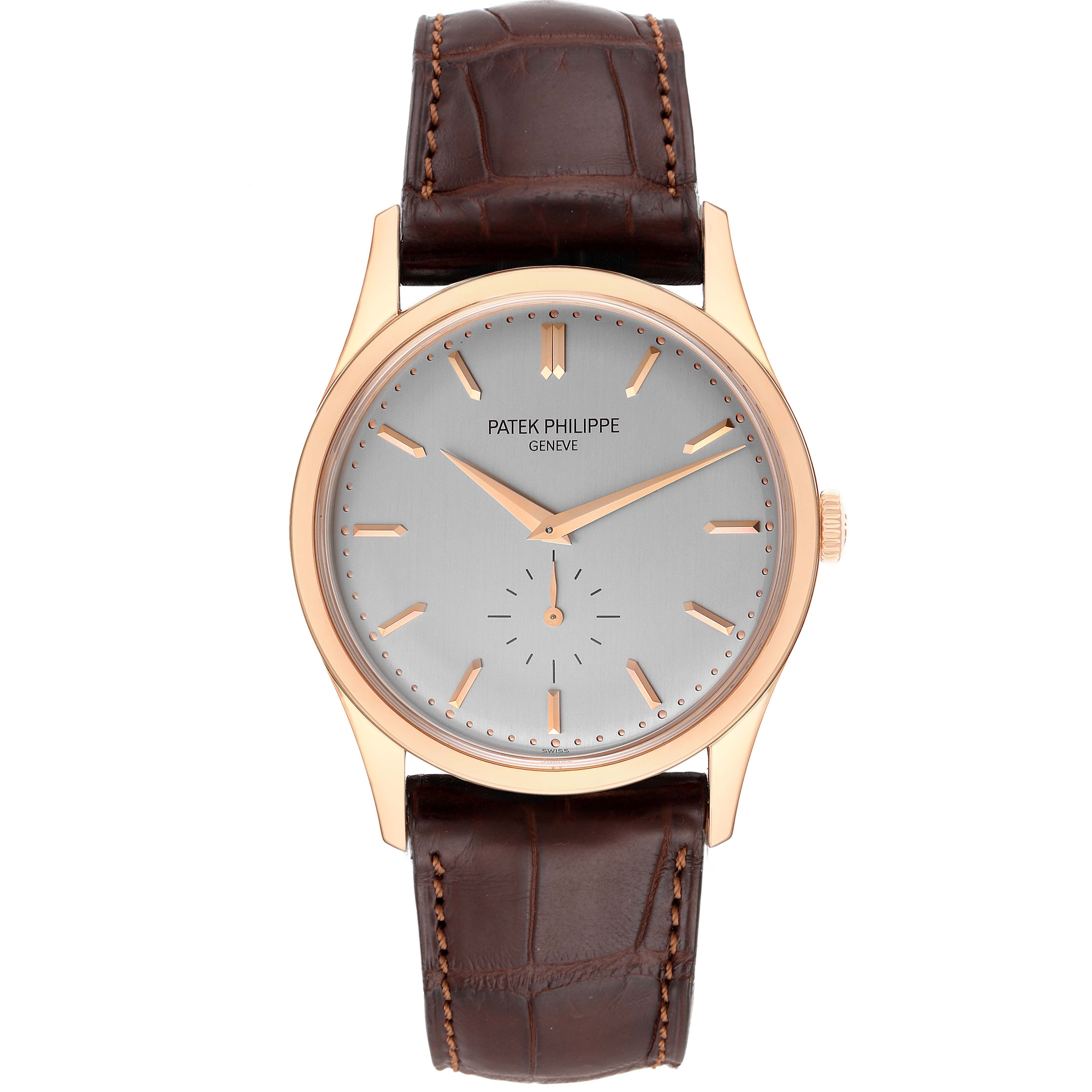 The image shows a front view of a Patek Philippe Calatrava 5196R Men's Rose Gold Silver Dial 5196R Men's Rose Gold Silver Dial watch with a brown leather strap and gold casing.