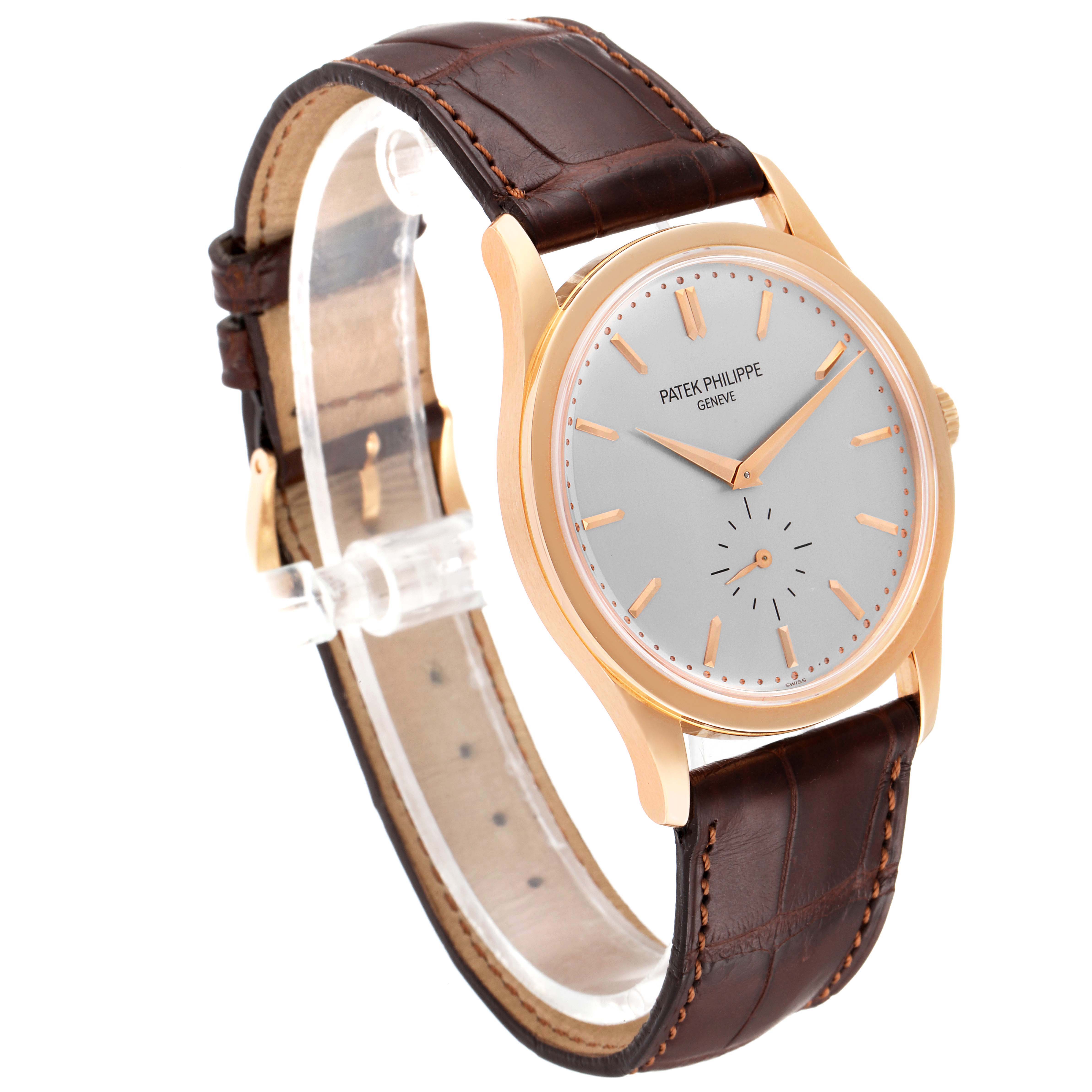 The image shows a Patek Philippe Calatrava 5196R Men's Rose Gold Silver Dial 5196R Men's Rose Gold Silver Dial watch at a three-quarter angle featuring the dial, case, and leather strap.