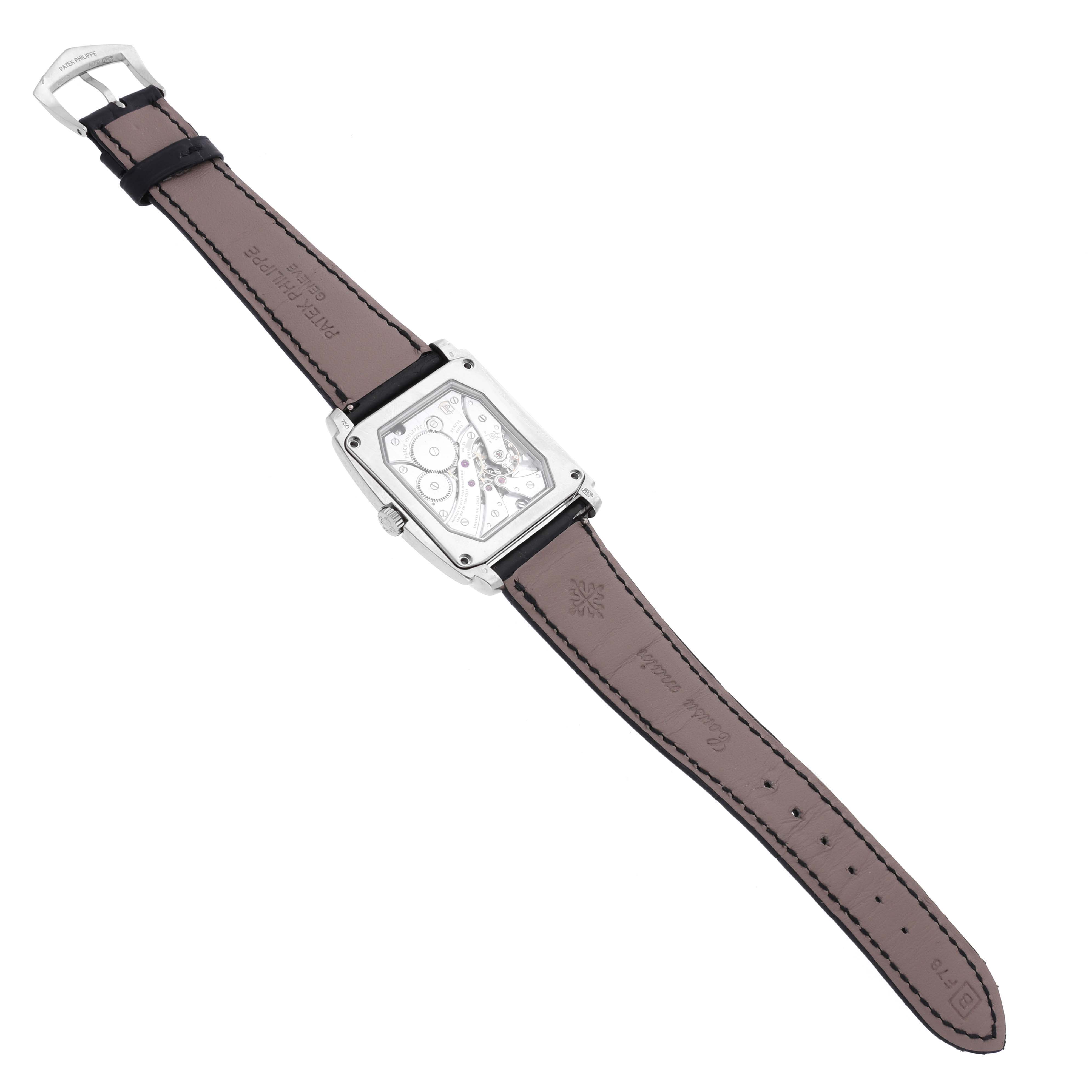 The image shows the back view of a Patek Philippe Gondolo 5124G-011 Men's White Gold Blue Dial 5124G-011 Men's White Gold Blue Dial watch, highlighting the movement and leather strap details.