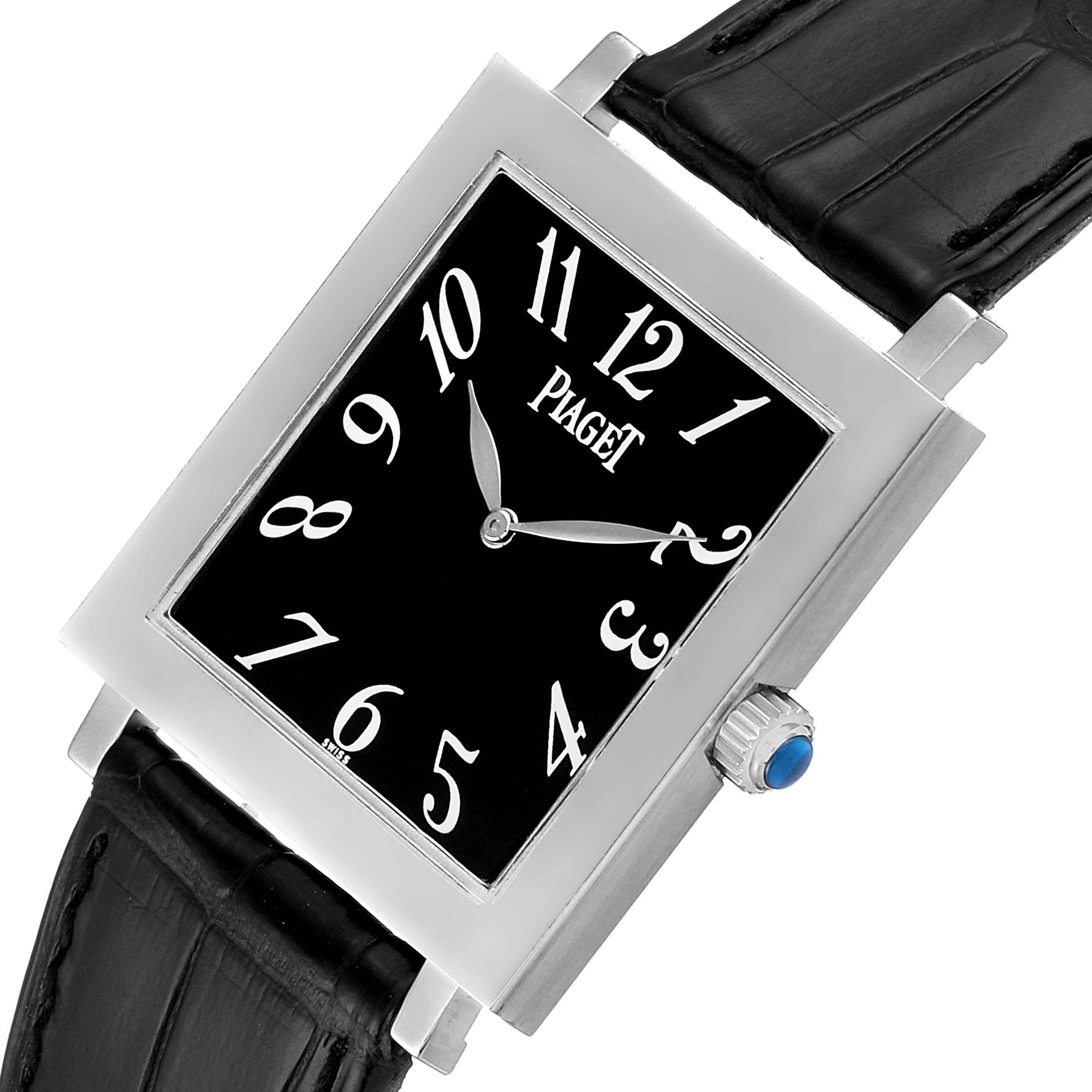 The image shows a tilted view of the Piaget 9930 Women's White Gold Black Dial 9930 Women's White Gold Black Dial Altiplano Ultra Thin 18K White Gold Black Dial Men's Watch 9930, highlighting the face, bezel, crown, and strap.
