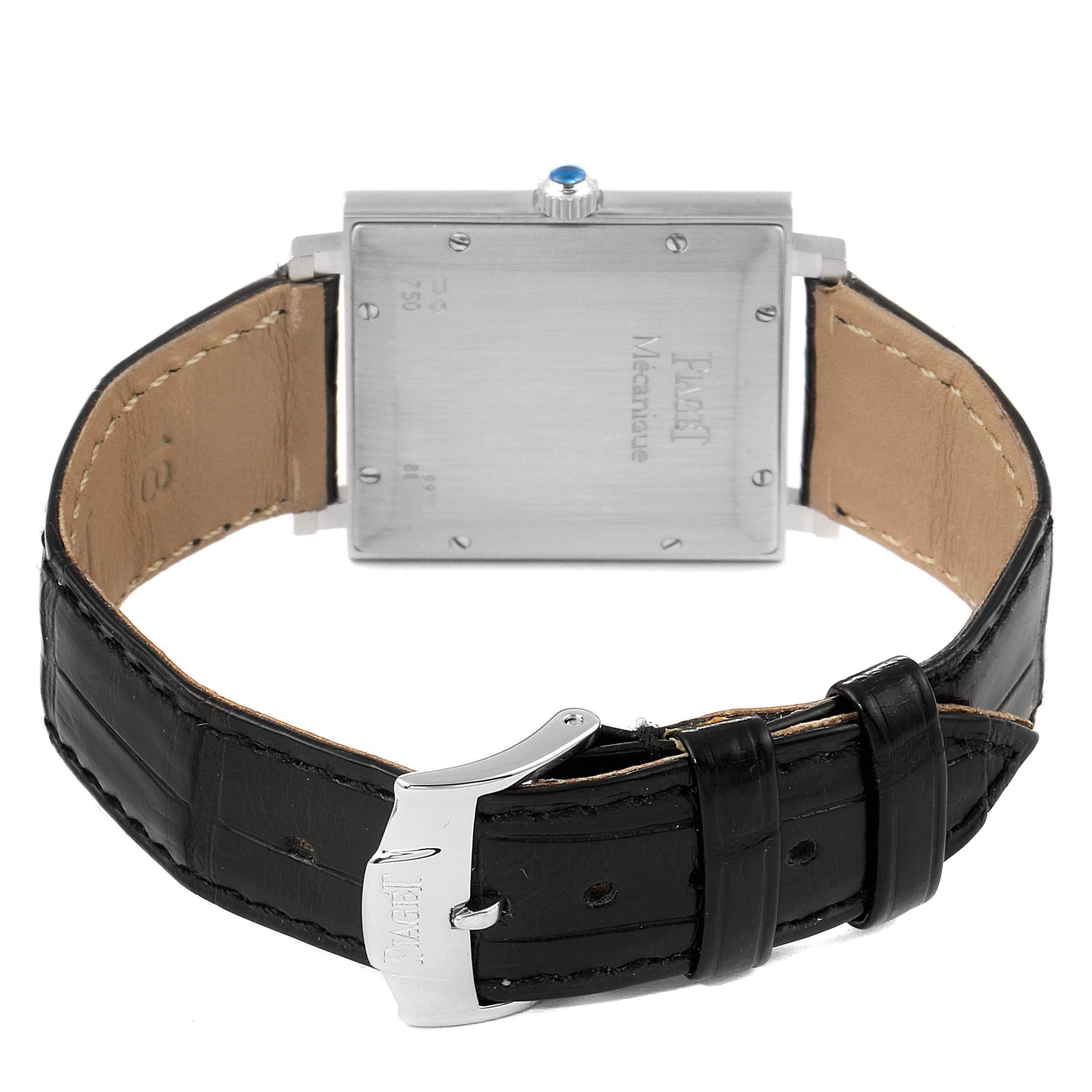 The image shows the back of the Piaget 9930 Women's White Gold Black Dial 9930 Women's White Gold Black Dial Altiplano Ultra Thin 18K White Gold Black Dial Mens Watch 9930, along with part of the black leather strap and clasp.