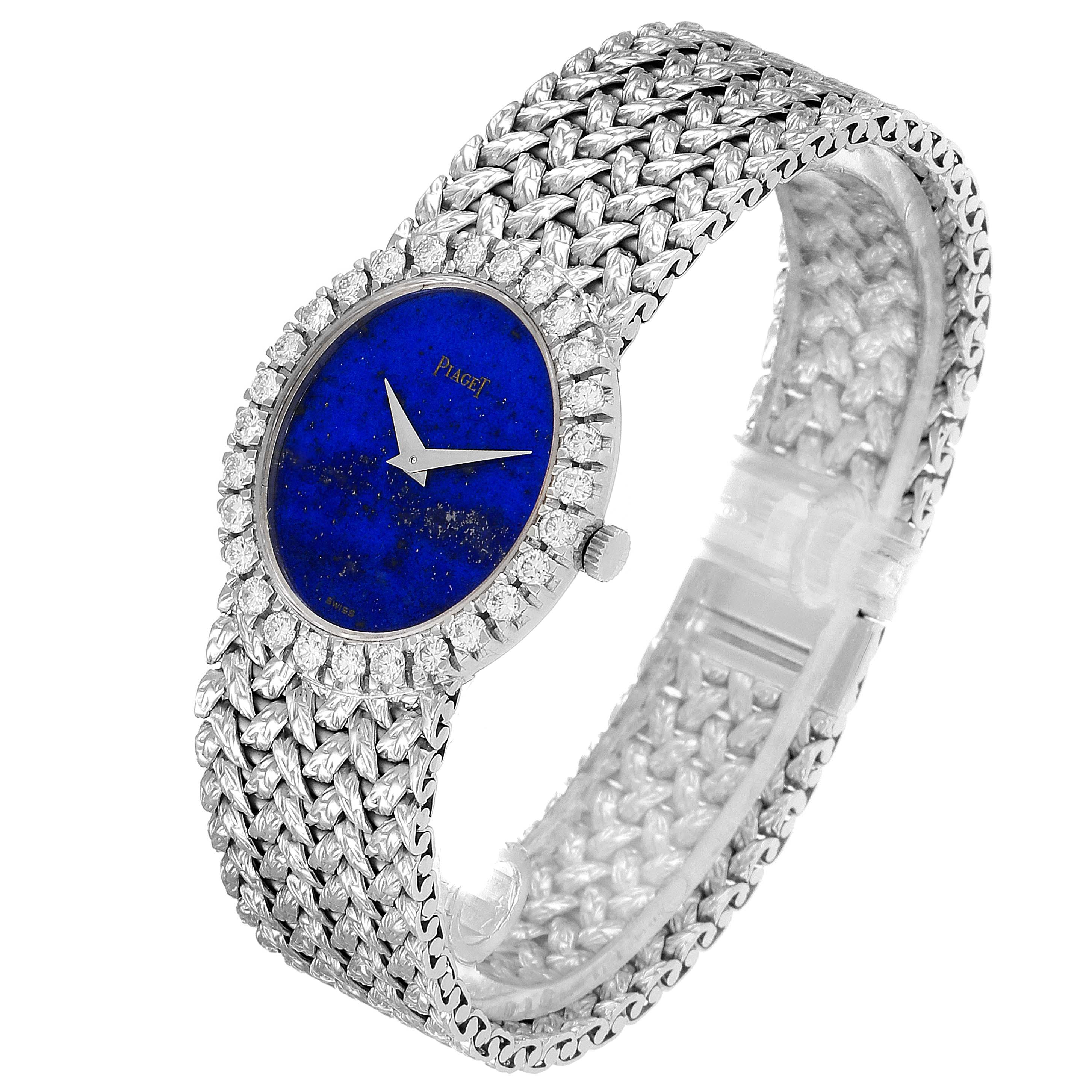 Side angle of the Piaget 9814 Women's White Gold Blue Dial 9814 Women's White Gold Blue Dial White Gold Lapis Lazuli Dial Diamond Vintage Cocktail Ladies Watch 9814, showcasing its dial and woven bracelet.