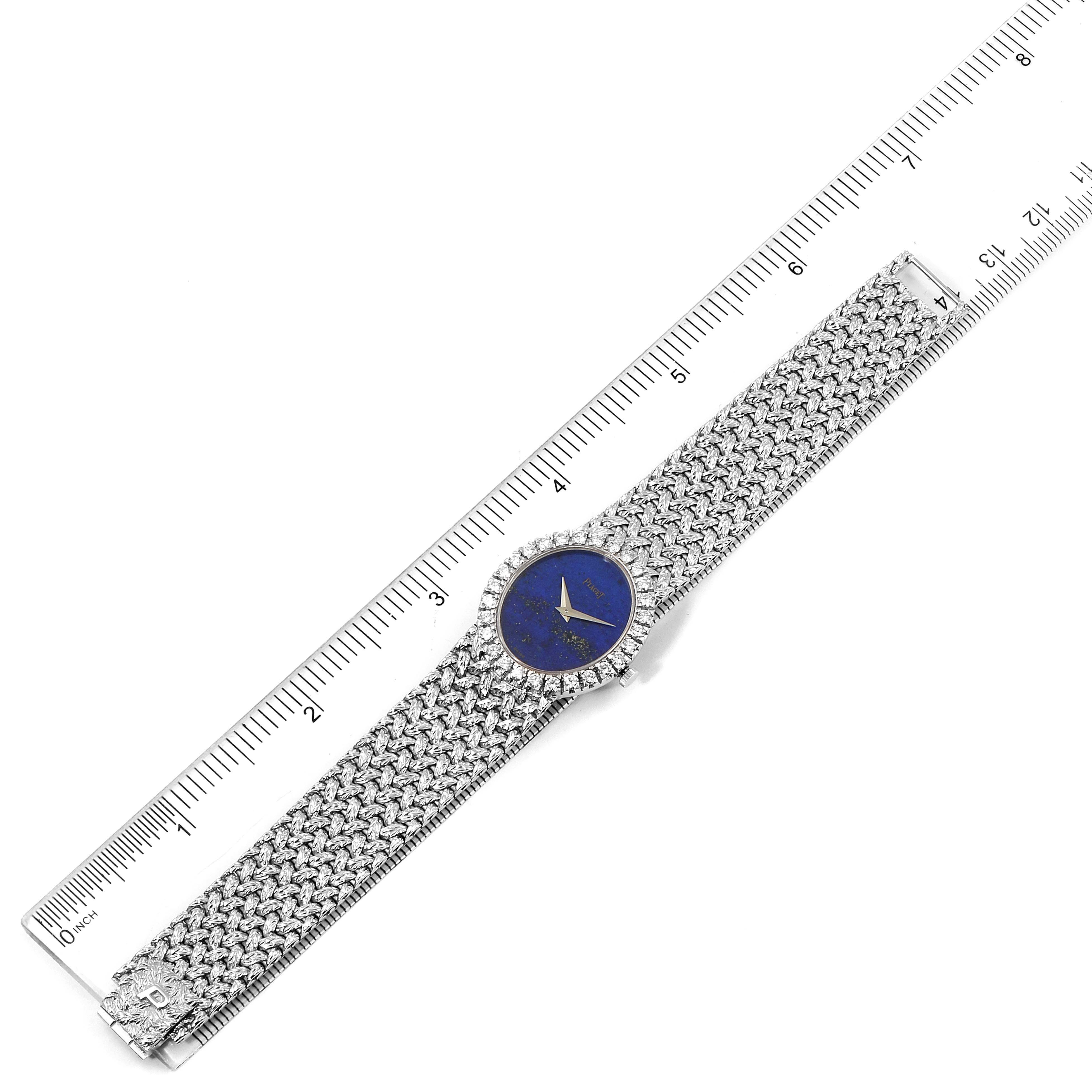 The image shows a top-down view of the Piaget 9814 Women's White Gold Blue Dial 9814 Women's White Gold Blue Dial 9814 White Gold Lapis Lazuli Dial Diamond Vintage Cocktail Ladies Watch placed next to a ruler.