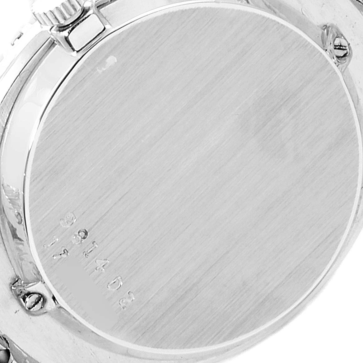 The image shows the back of the Piaget 9814 Women's White Gold Blue Dial 9814 Women's White Gold Blue Dial White Gold Lapis Lazuri Dial Diamond Vintage Cocktail Ladies Watch 9814 model, including part of the crown.