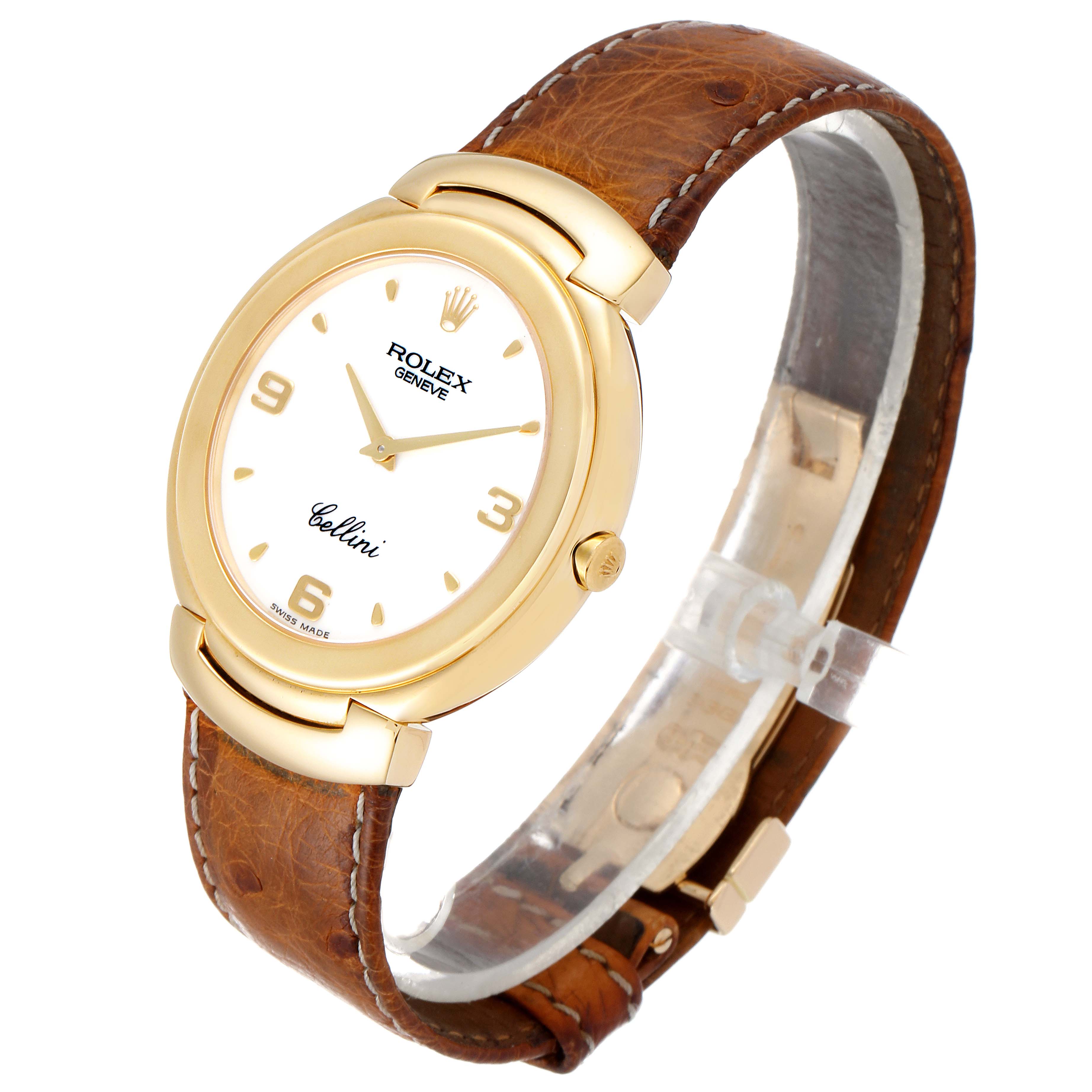 The Rolex Cellini 6623 Men's Yellow Gold White Dial 6623 Men's Yellow Gold White Dial watch is shown at a slightly tilted angle, highlighting its face, crown, and brown leather strap.