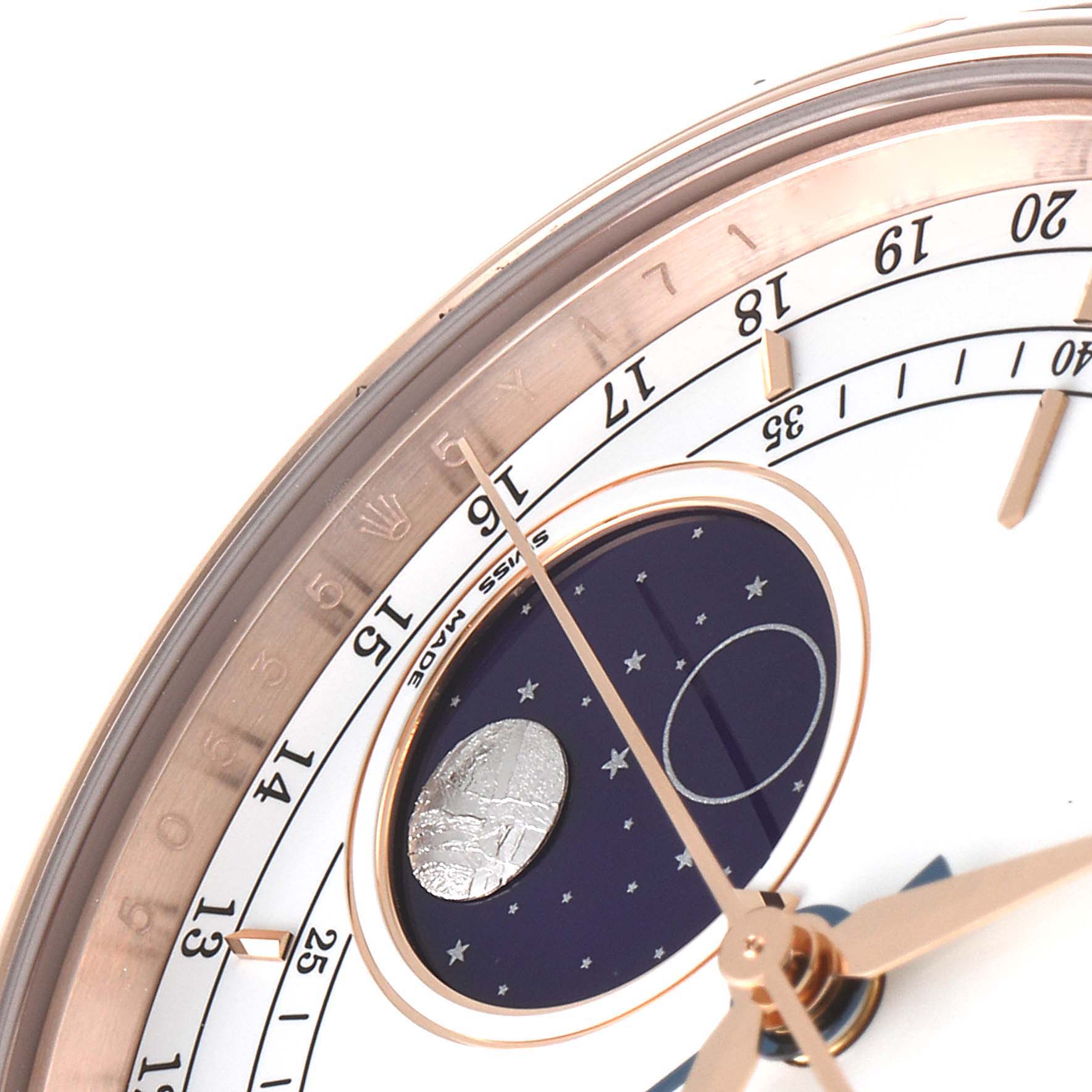 This image shows a close-up of the face of a Rolex Cellini 50535 Men's Rose Gold White Dial 50535 Men's Rose Gold White Dial watch, highlighting the moonphase and date indicators.