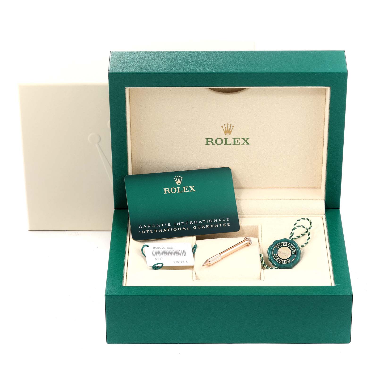 This image shows the packaging and accessories for a Rolex Cellini 50535 Men's Rose Gold White Dial 50535 Men's Rose Gold White Dial watch, including the guarantee card, manual, and tag.