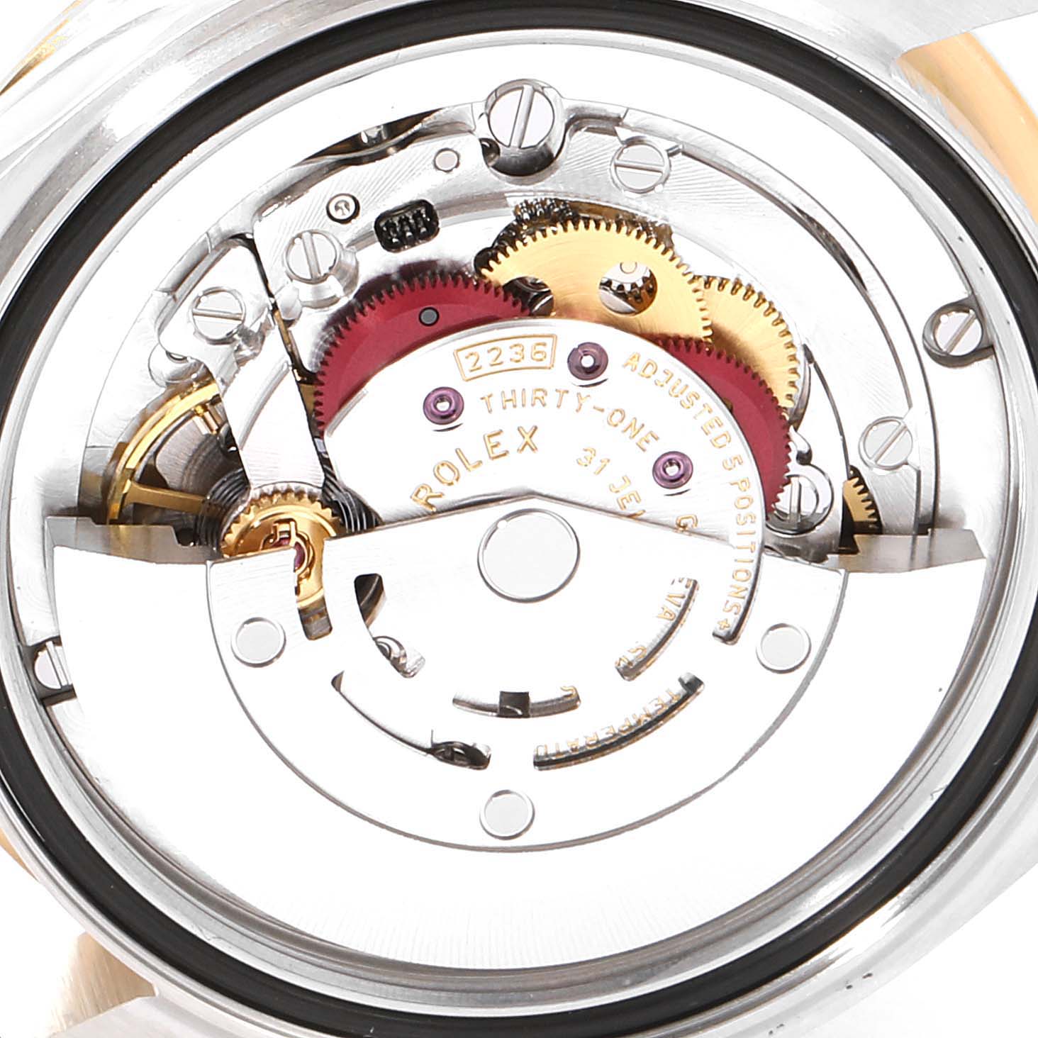 This image shows the movement mechanism of a Rolex Mid-Size 278383 Women's Steel and Gold (two tone) Green Dial 278383 Women's Steel and Gold (two tone) Green Dial watch, displaying gears and components from the back.