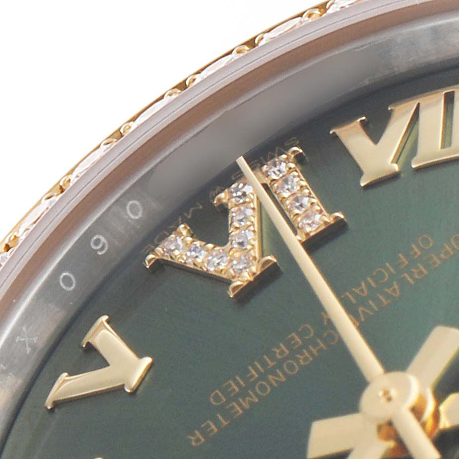This close-up image shows the upper part of the dial and bezel of a Mid-Size Rolex watch, highlighting the Roman numeral VI with diamonds.