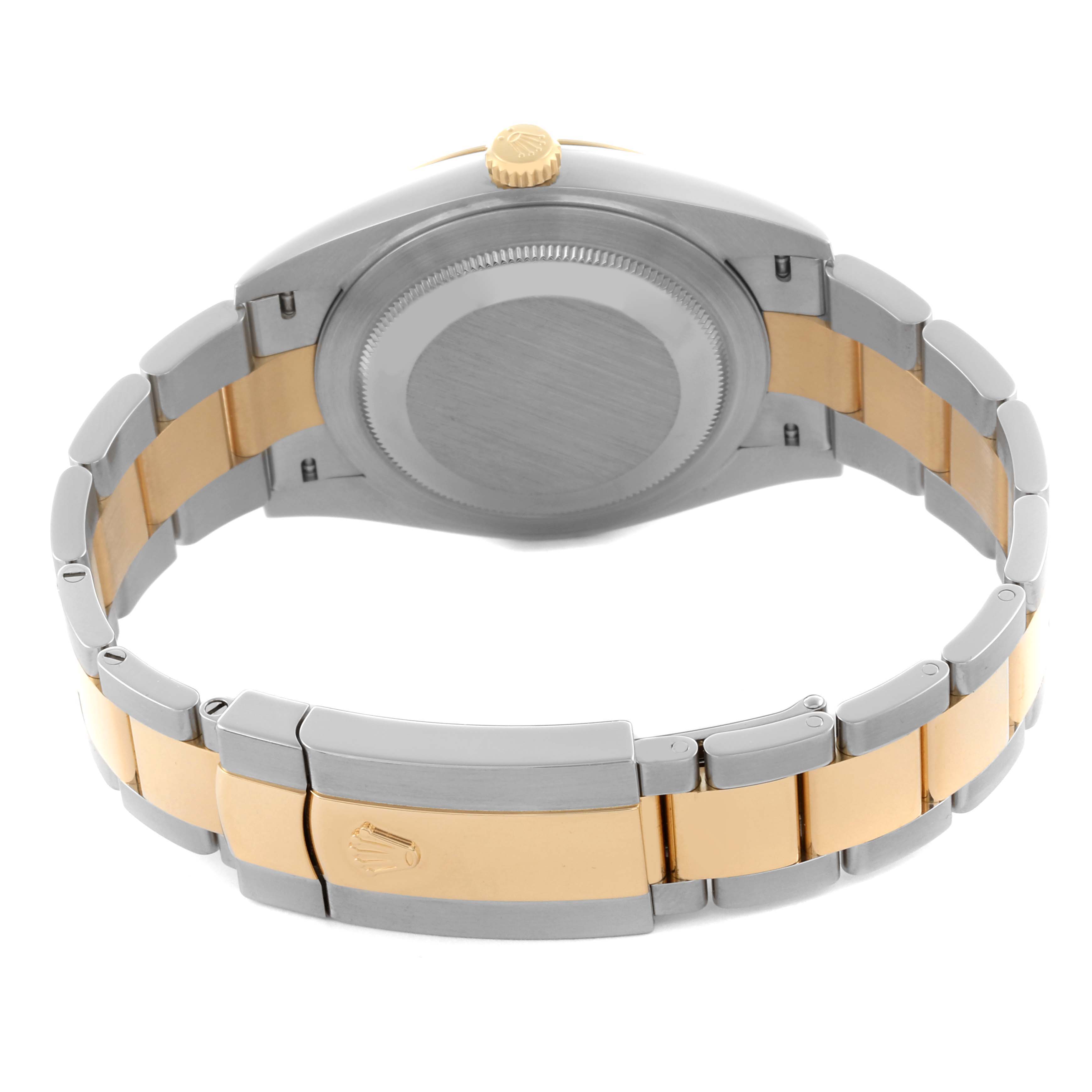 The Rolex Datejust 41 126333 Men's Steel and Gold (two tone) Black Dial 126333 Men's Steel and Gold (two tone) Black Dial is shown from the back, highlighting the case back, crown, and two-tone bracelet with clasp.