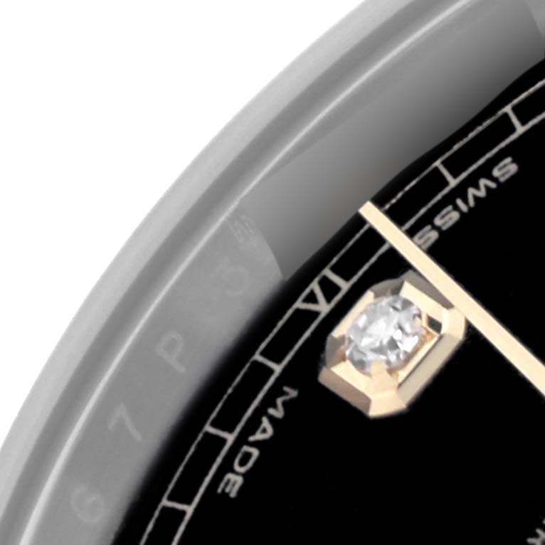 The image shows a close-up of the Rolex Datejust 41 126333 Men's Steel and Gold (two tone) Black Dial 126333 Men's Steel and Gold (two tone) Black Dial dial, highlighting a gemstone marker and the edge of the dial.