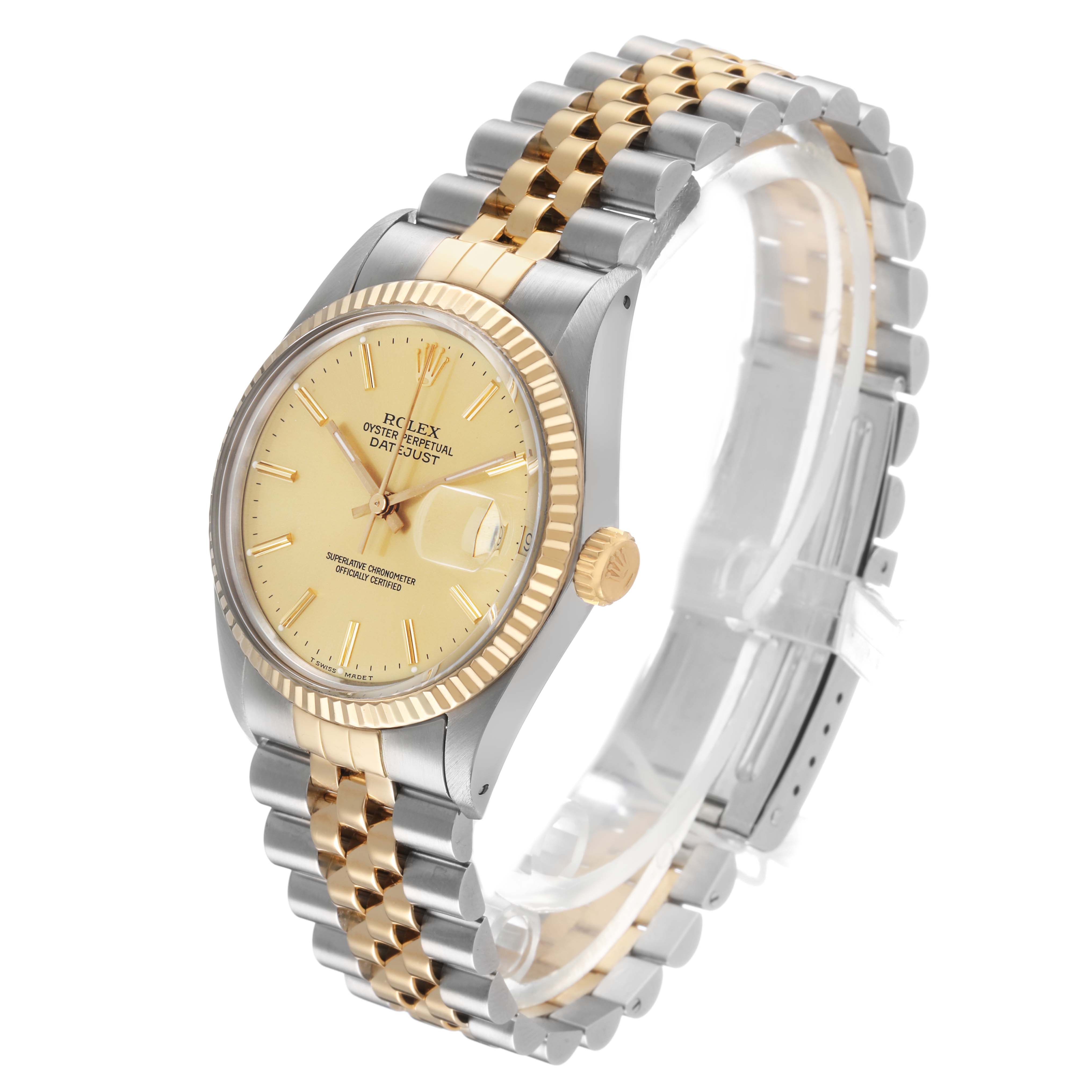 The Rolex Datejust 16013 Men's Stainless Steel Champagne Dial watch is shown at a three-quarter angle highlighting the face, fluted bezel, crown, and two-tone bracelet.