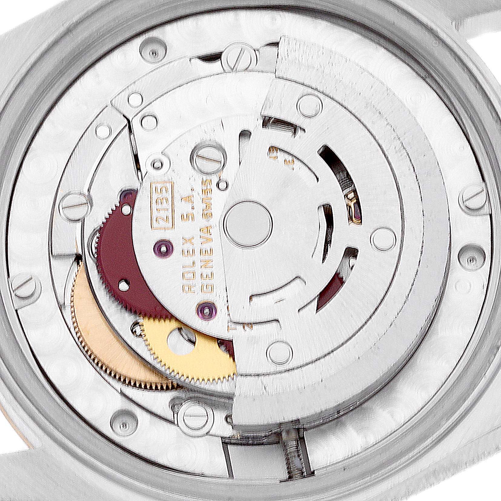 The image shows the internal mechanical movement parts of a Mid-Size Rolex watch, viewed from the back.