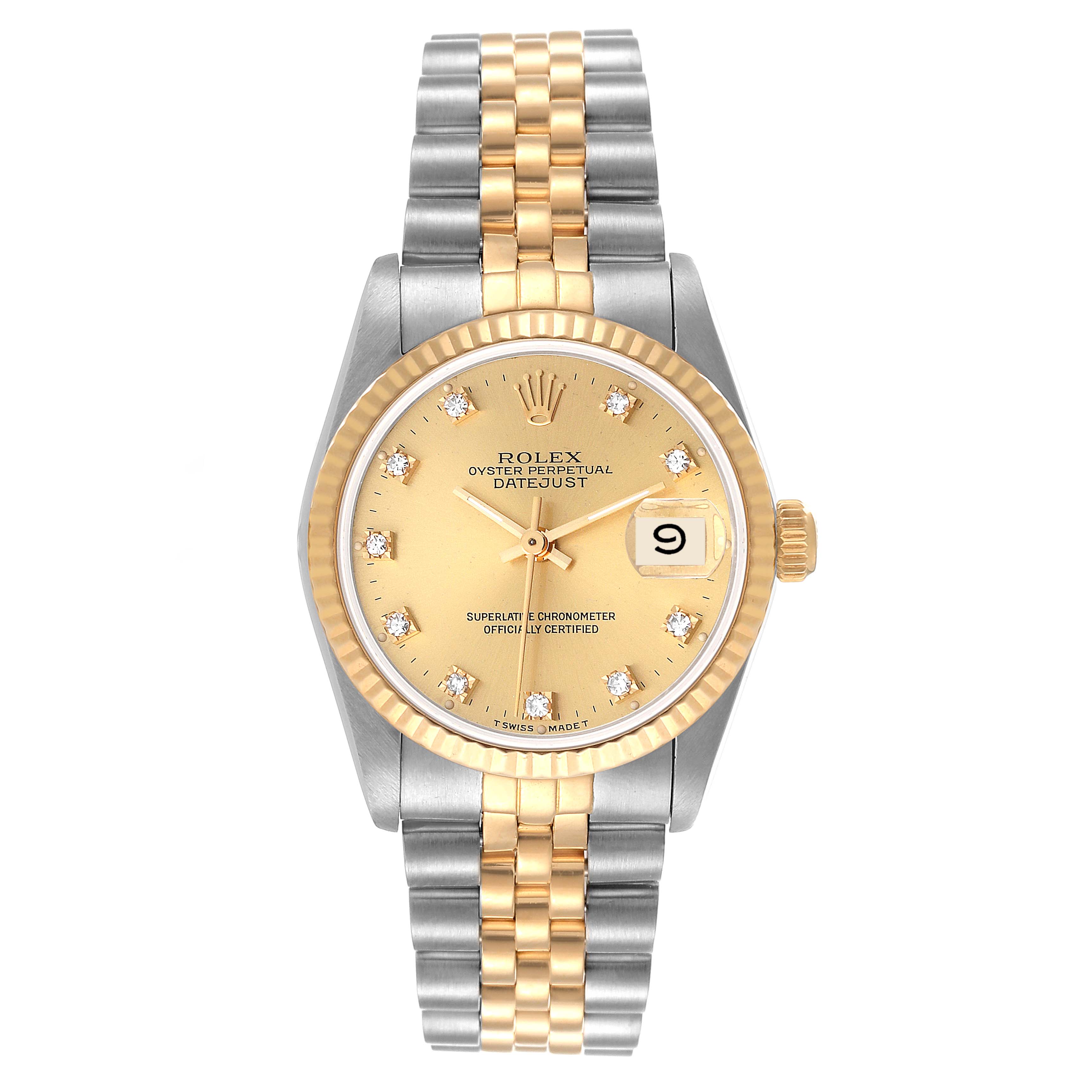 The Rolex Mid-Size 68273 Women
s Steel and Gold (two tone) Champagne Dial 68273 Women
s Steel and Gold (two tone) Champagne Dial Datejust watch is shown from a top-down angle, highlighting the face, bezel, crown, and bracelet.