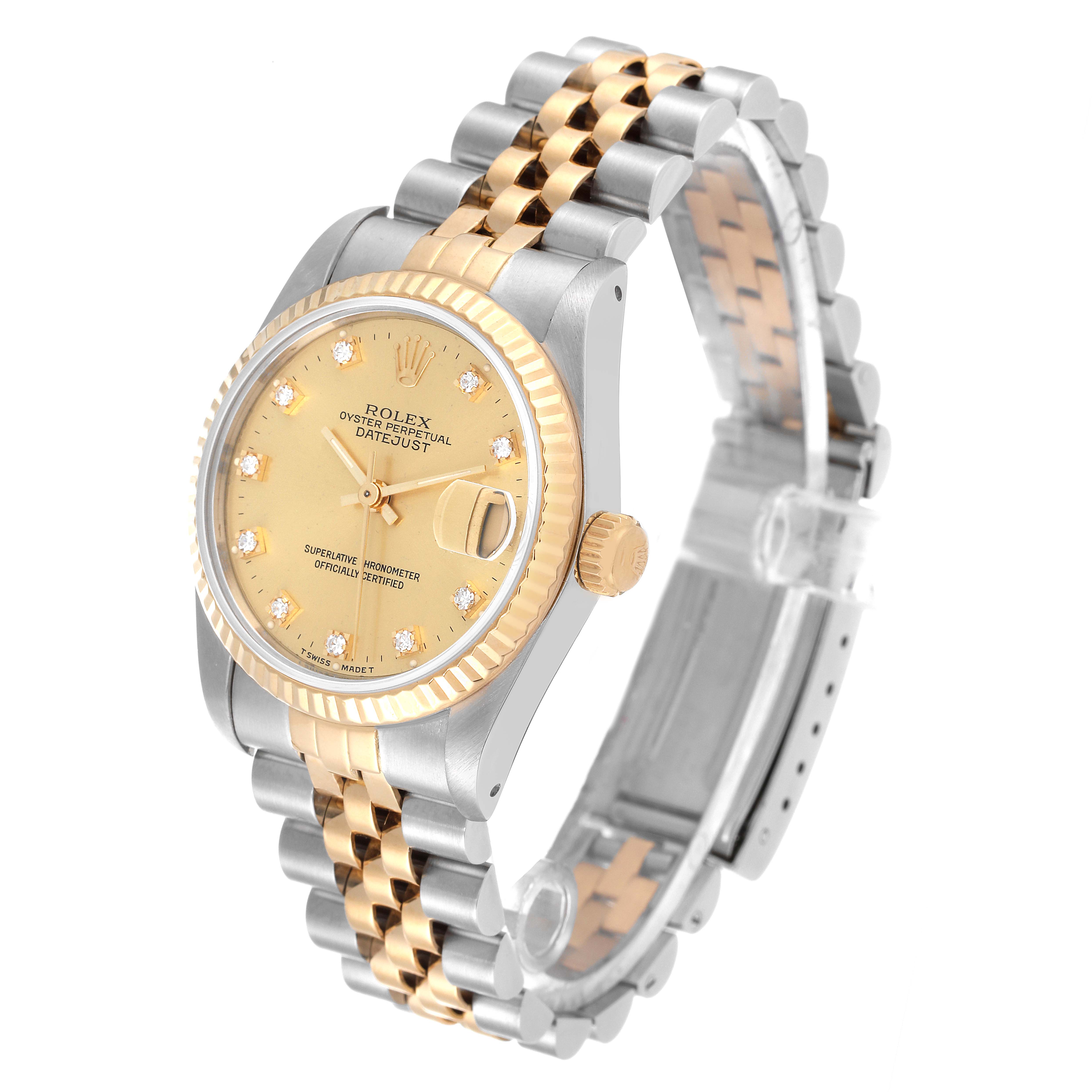 This image shows a Mid-Size Rolex Datejust in a three-quarter angle, highlighting its two-tone bracelet, fluted bezel, and dial.