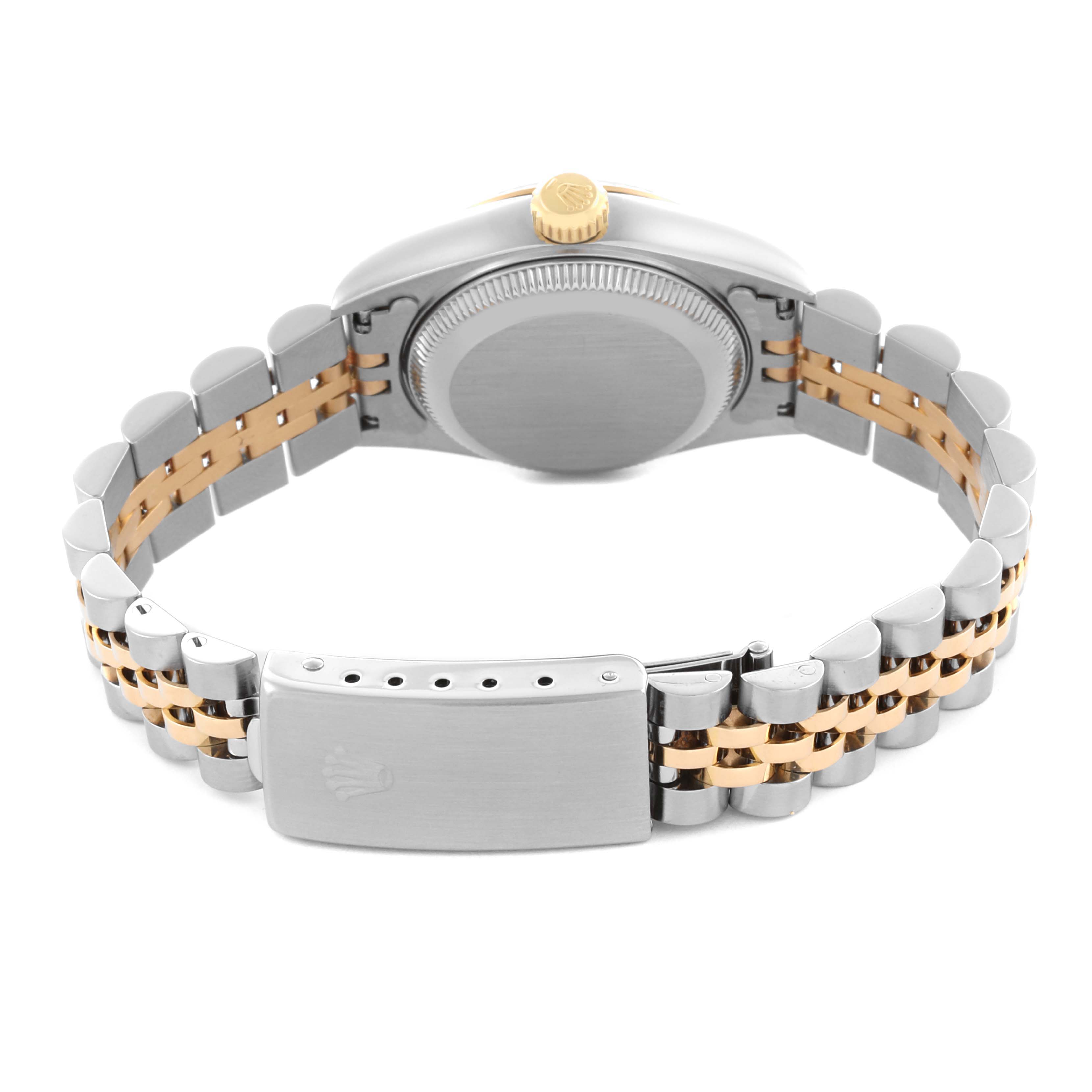 The Rolex Datejust 69173 Women's Steel and Gold (two tone) Silver Dial 69173 Women's Steel and Gold (two tone) Silver Dial watch is shown from the back, highlighting the case back, bracelet, and clasp.