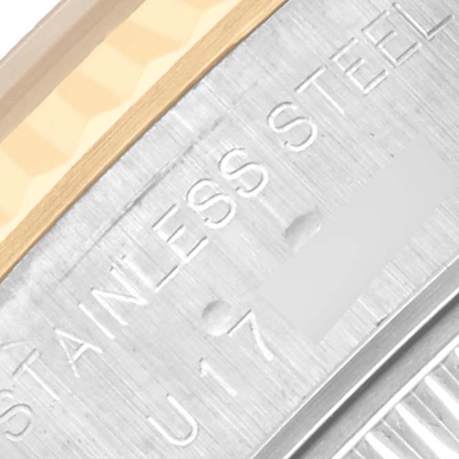 The image shows a close-up angle of the rim and part of the casing with "STAINLESS STEEL" engraved on a Rolex Datejust 69173 Women's Steel and Gold (two tone) Silver Dial 69173 Women's Steel and Gold (two tone) Silver Dial.