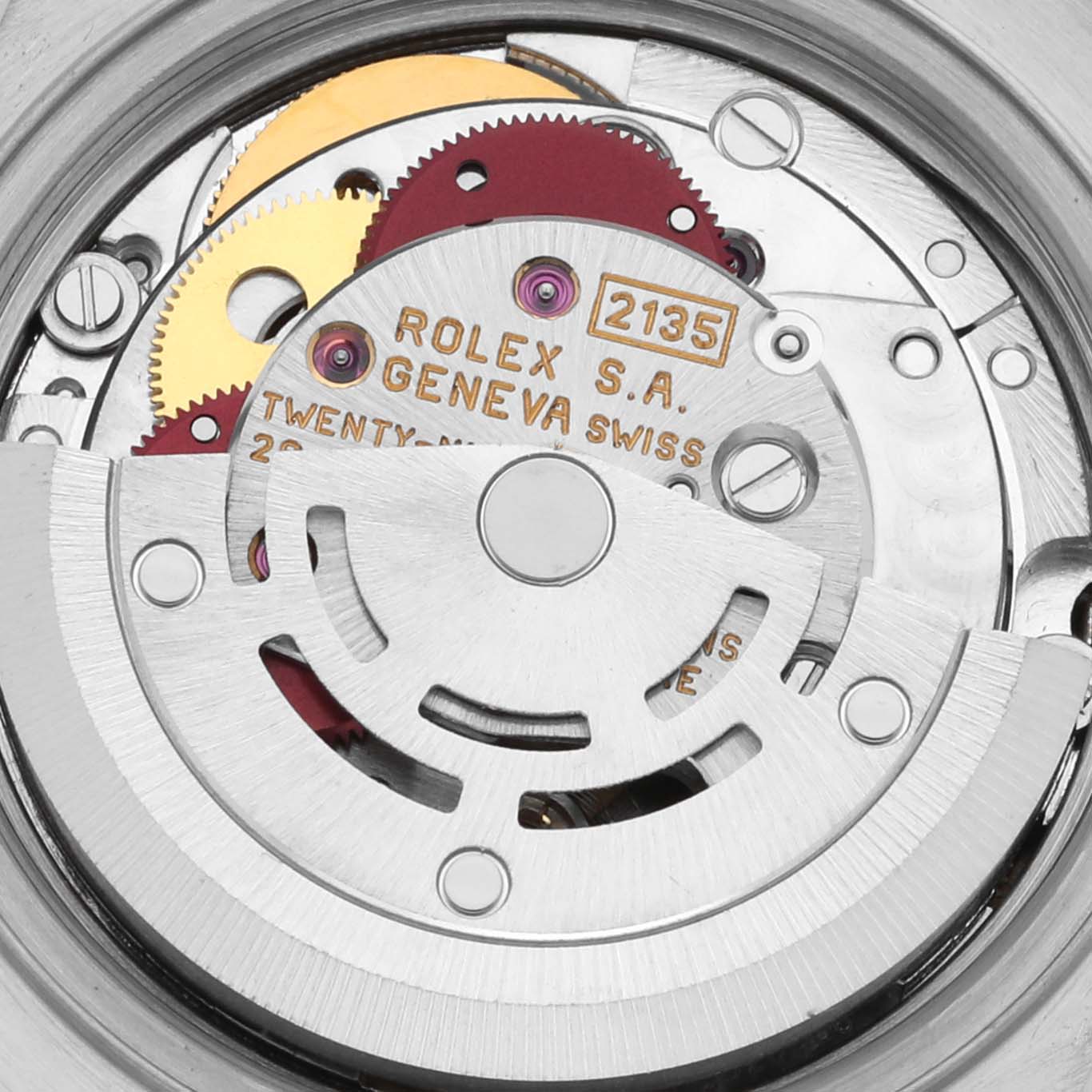 The image shows a detailed view of the Rolex Datejust 69173 Women's Steel and Gold (two tone) Silver Dial 69173 Women's Steel and Gold (two tone) Silver Dial movement, highlighting gears and inscriptions.