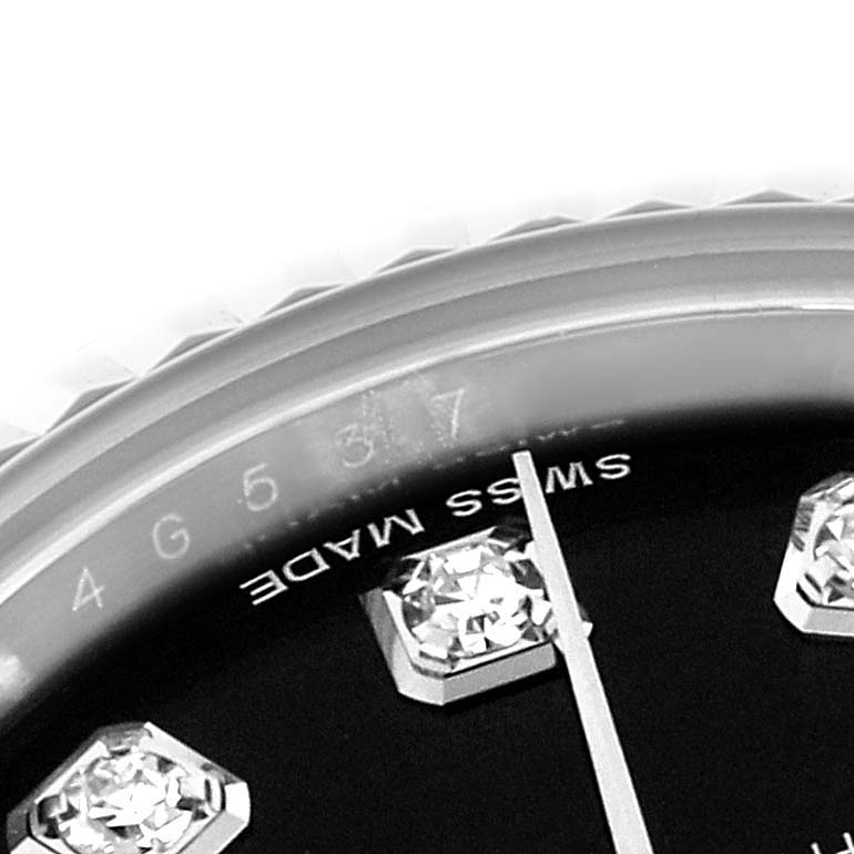 The image shows a close-up of the Rolex Datejust 179174 Women's Stainless Steel Black Dial 179174 Women's Stainless Steel Black Dial watch dial, with diamond hour markers and the "SWISS MADE" text partially visible.