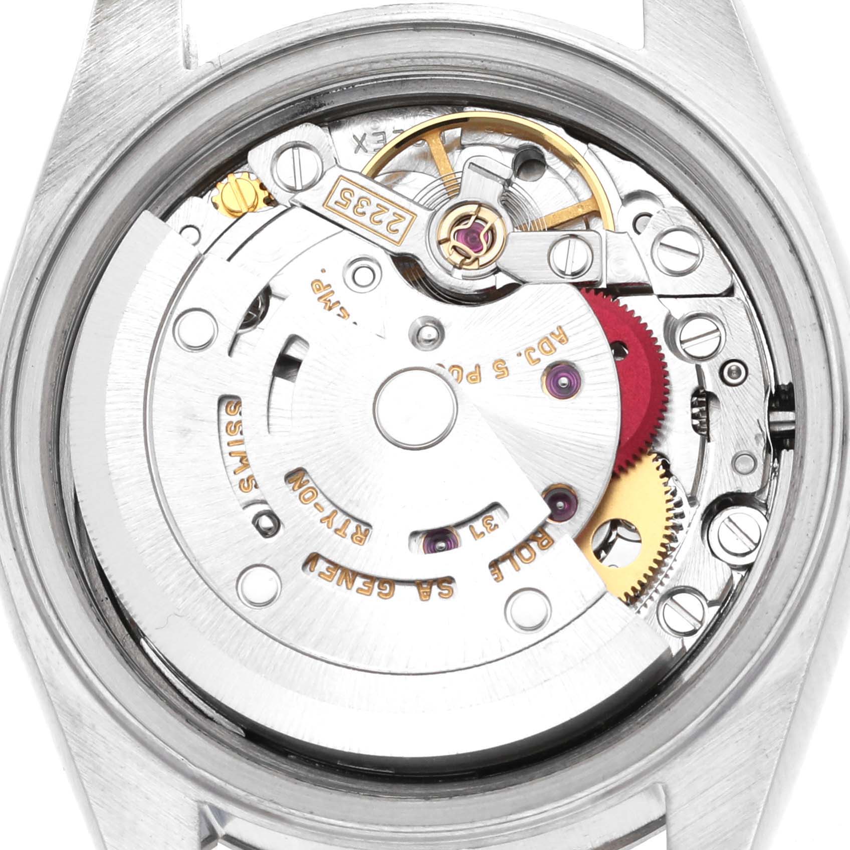 The image shows the movement of a Rolex Datejust 79174 Women's Stainless Steel Silver Dial 79174 Women's Stainless Steel Silver Dial watch from a back angle, highlighting its intricate components and mechanics.