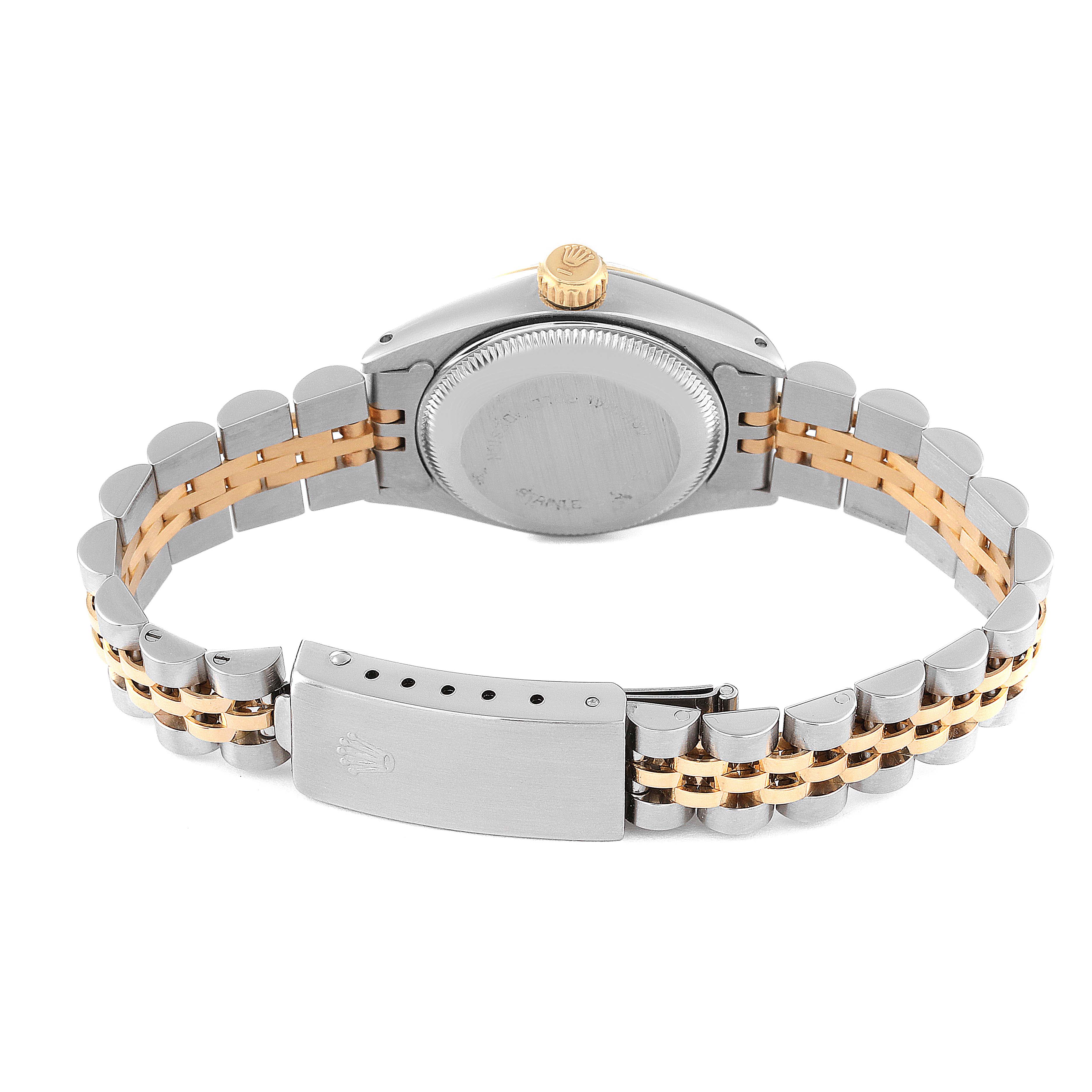 This image shows the back view of the Rolex Datejust 6917 Women's Steel and Gold (two tone) Champagne Dial 6917 Women's Steel and Gold (two tone) Champagne Dial watch, including its case back, crown, and bracelet clasp.