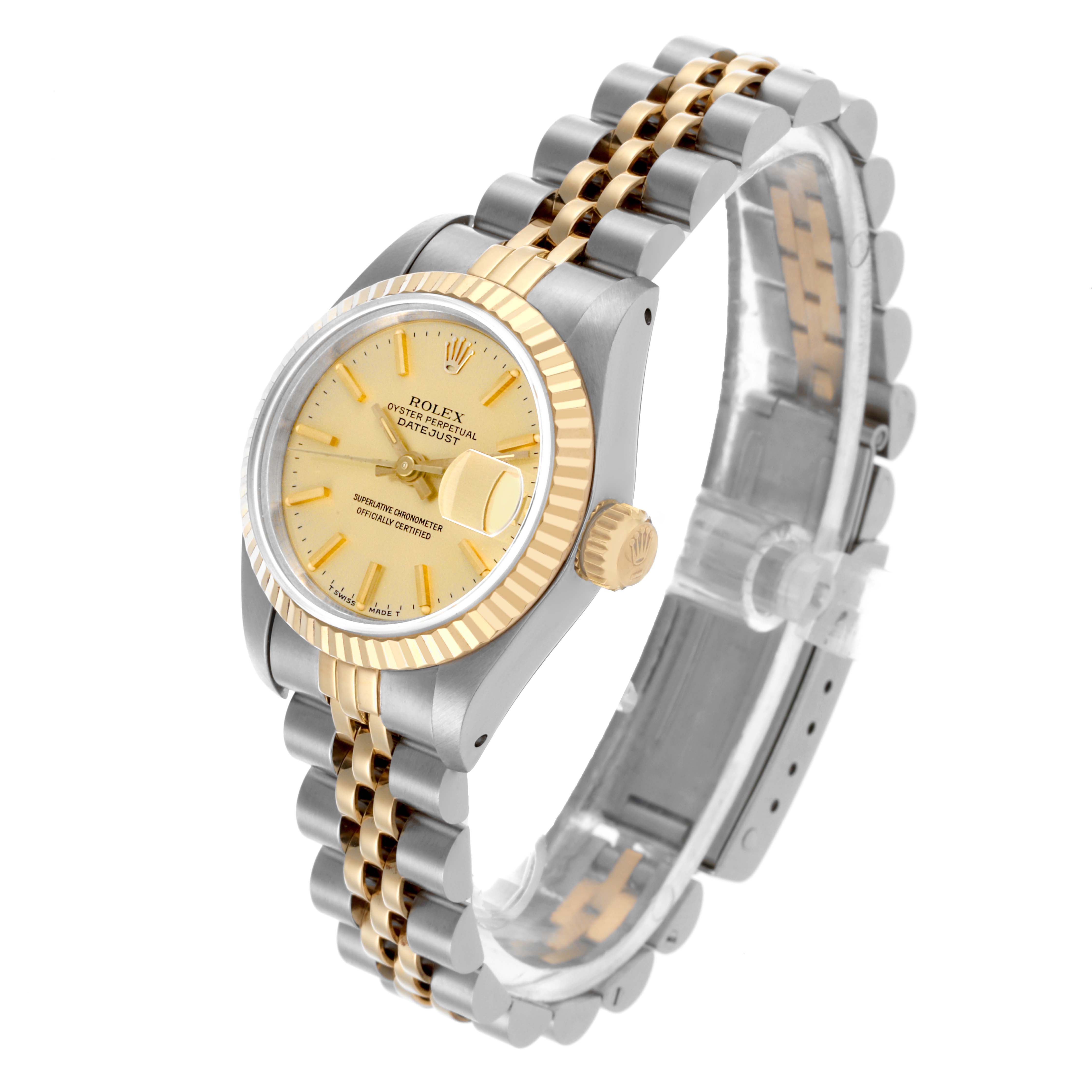 The watch, a Rolex Datejust 69173 Women
s Steel and Gold (two tone) Champagne Dial 69173 Women
s Steel and Gold (two tone) Champagne Dial, is shown at a three-quarter angle highlighting the face, bracelet, and fluted bezel.