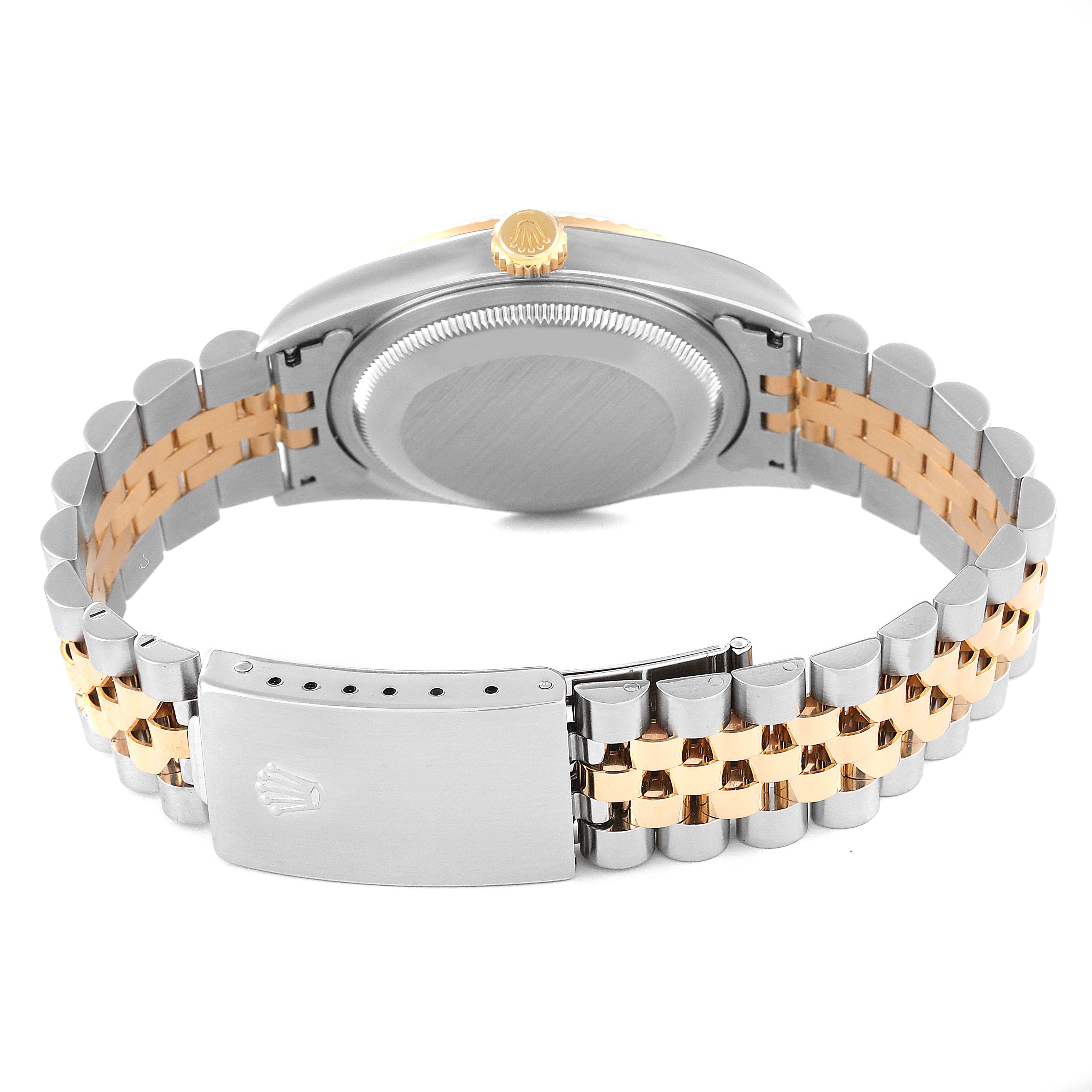 The image shows the back view of a Rolex Datejust 16233 Men's Steel and Gold (two tone) Silver Dial 16233 Men's Steel and Gold (two tone) Silver Dial watch, highlighting its two-tone bracelet and clasp.