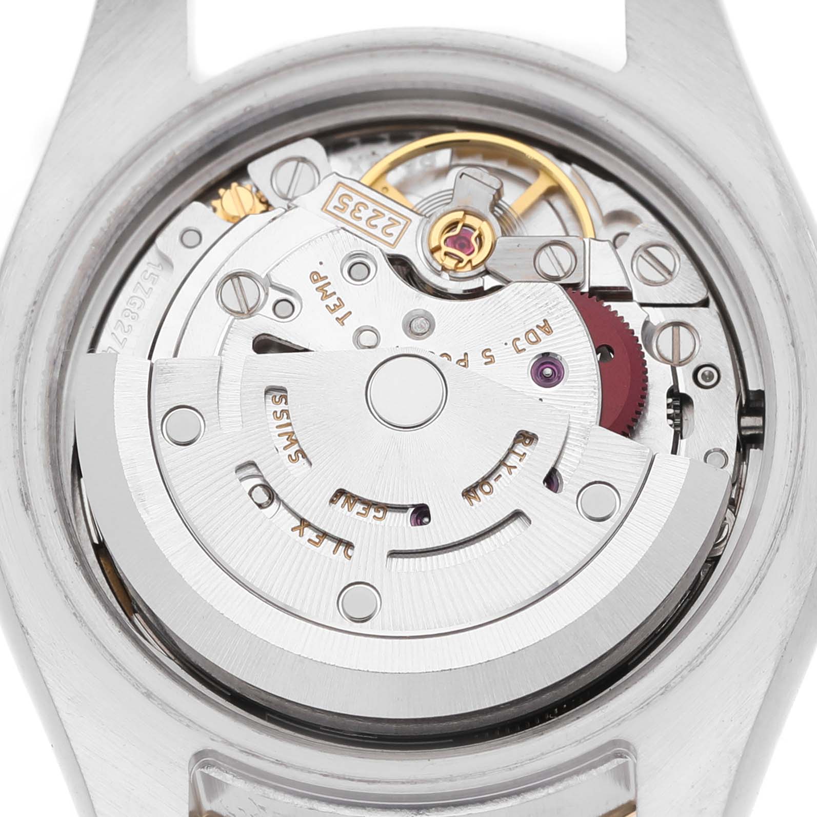 This image shows the movement of a Rolex Datejust 179173 Women's Stainless Steel White Dial, viewed from the back, highlighting its intricate mechanical components.
