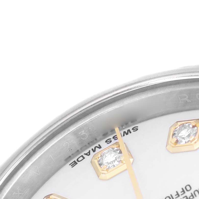 The image shows a partial view of a Rolex Datejust 179173 Women's Stainless Steel White Dial watch dial with diamond markers and "SWISS MADE" text.