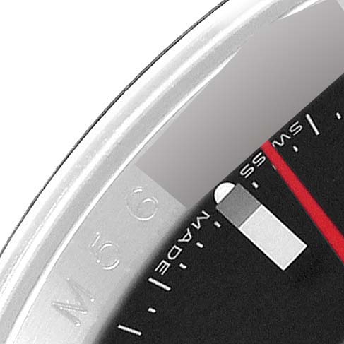 The image shows a close-up of the Rolex Turn-o-Graph 116264 Men's Stainless Steel Black Dial watch bezel and part of the dial at an angle, highlighting the bezel markings.