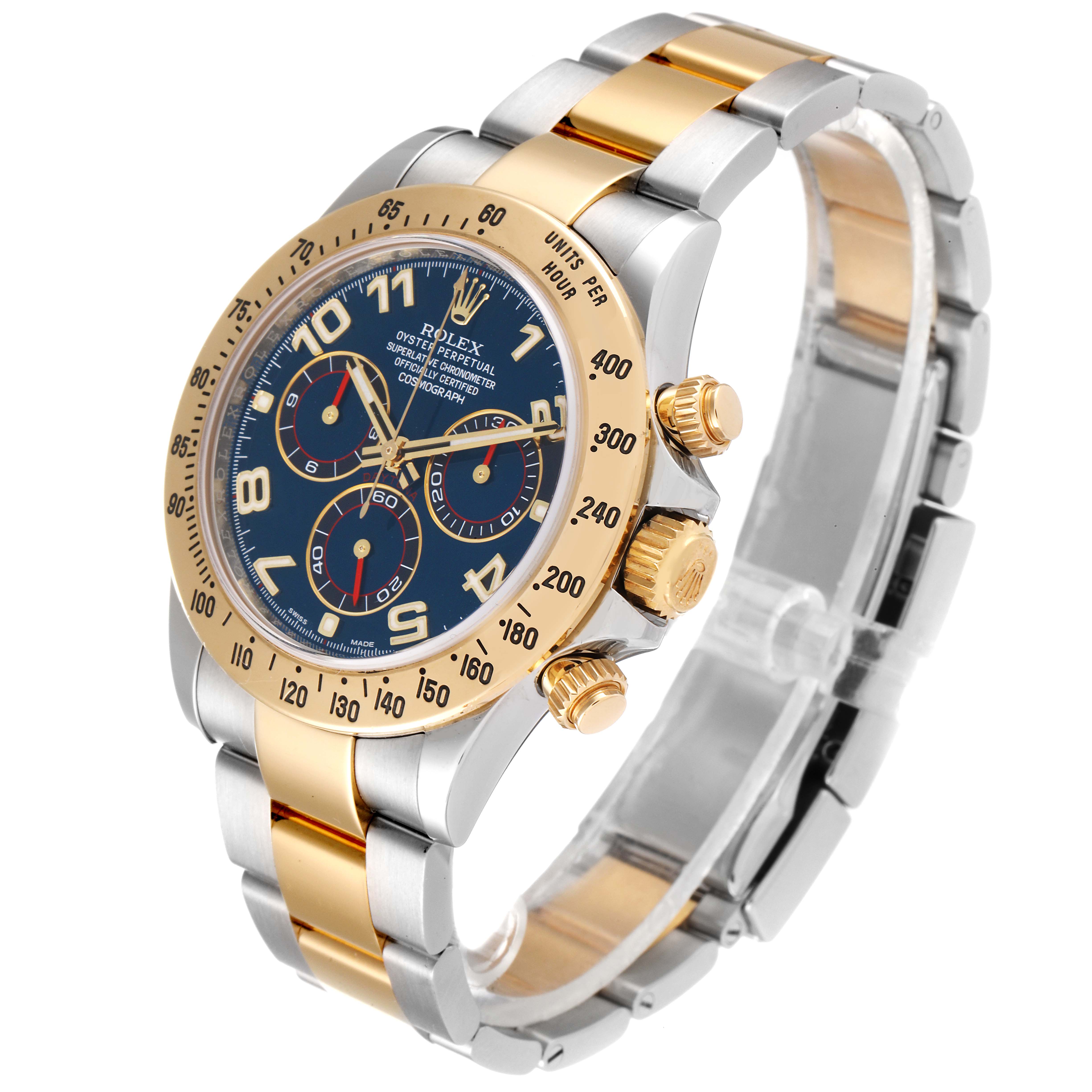 The Rolex Daytona 116523 Men
s Steel and Gold (two tone) Blue Dial 116523 Men
s Steel and Gold (two tone) Blue Dial watch is shown at a three-quarter angle, highlighting its bracelet, bezel, subdials, and crown.